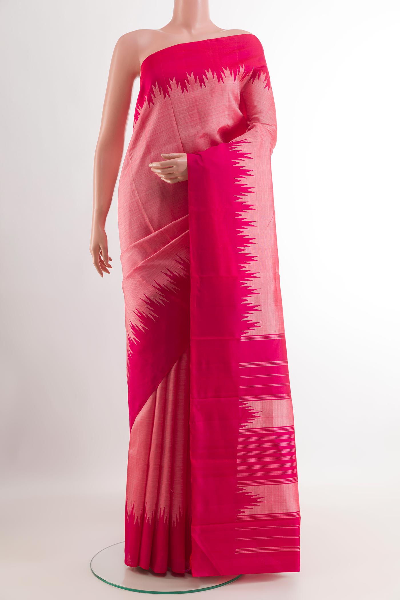 Pink Kanchipuram Silk Saree with Plain Body and Temple Border.  displayed on a mannequin