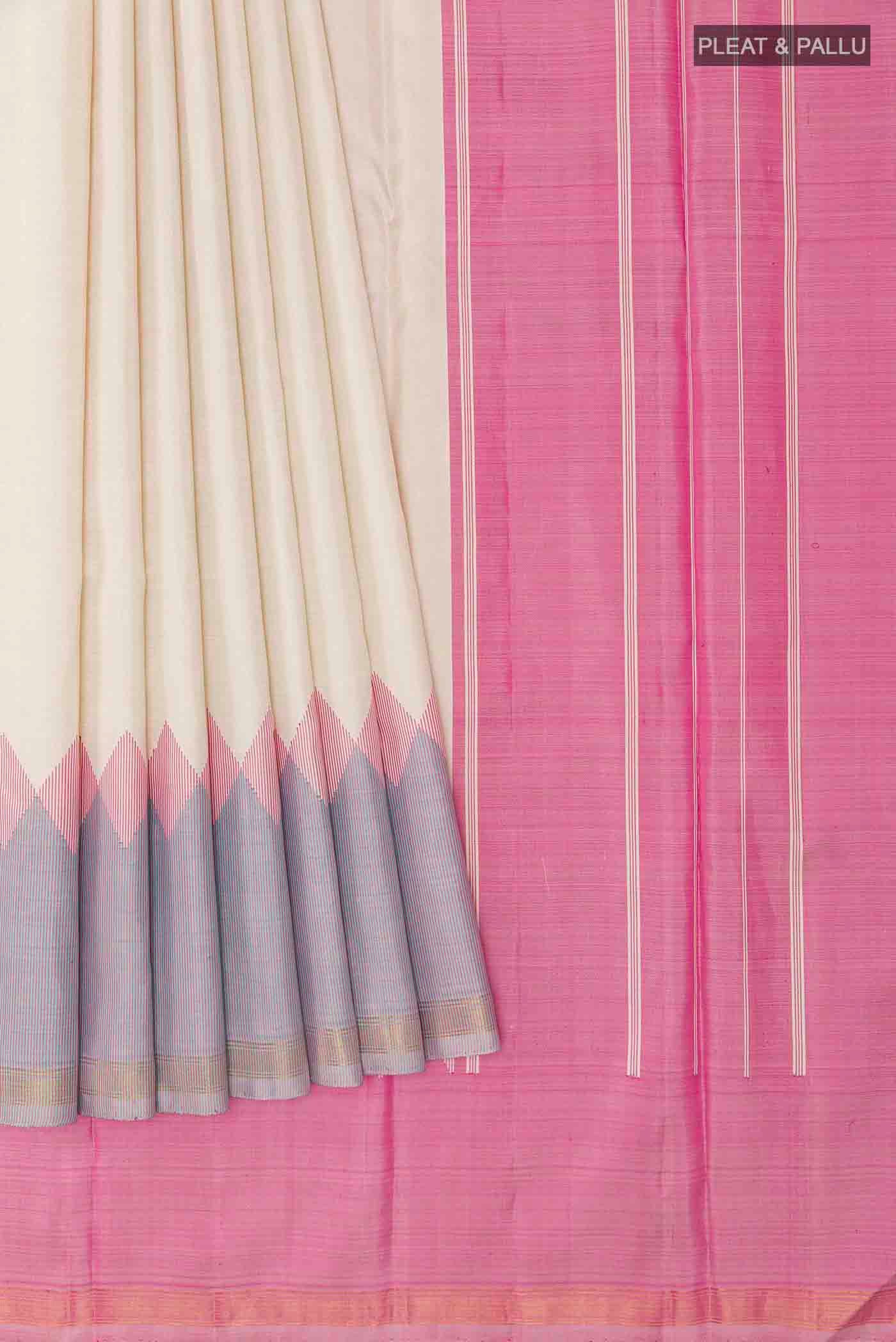 Pleats and pallu of Off White Kanchipuram Silk Saree with Plain Body and Zari Border
