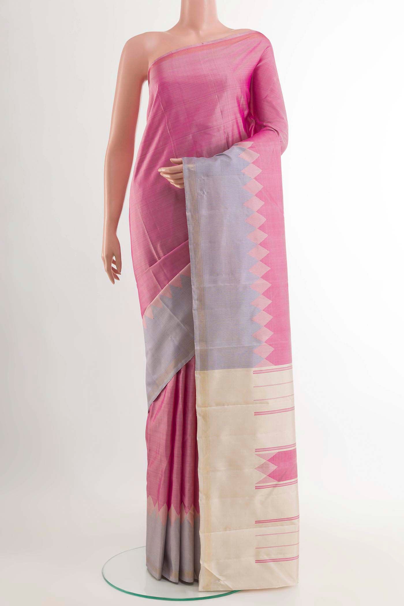 Pink Kanchipuram Silk Saree with Plain Body and Zari Border displayed on a mannequin