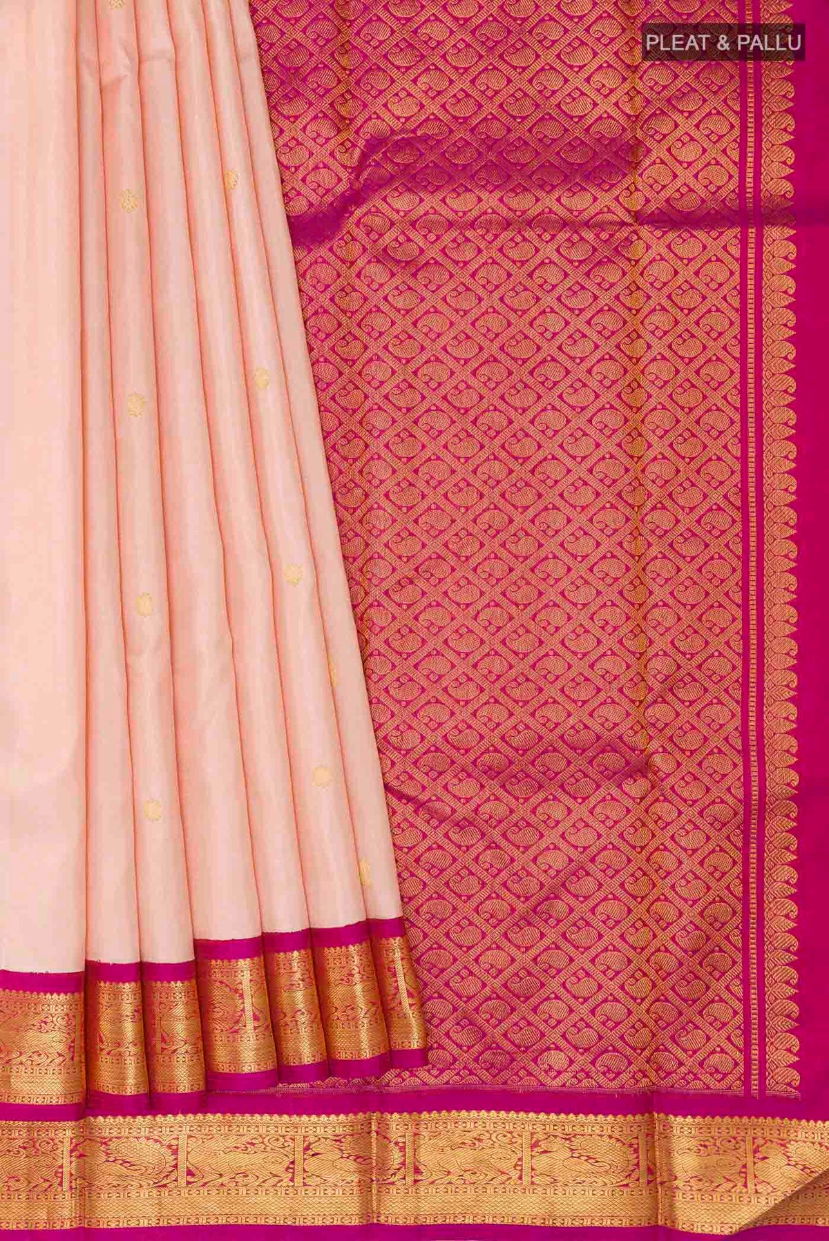 Pleats and pallu of Rose pink Kanchipuram Silk Saree with Zari Butta on the body and Zari Border