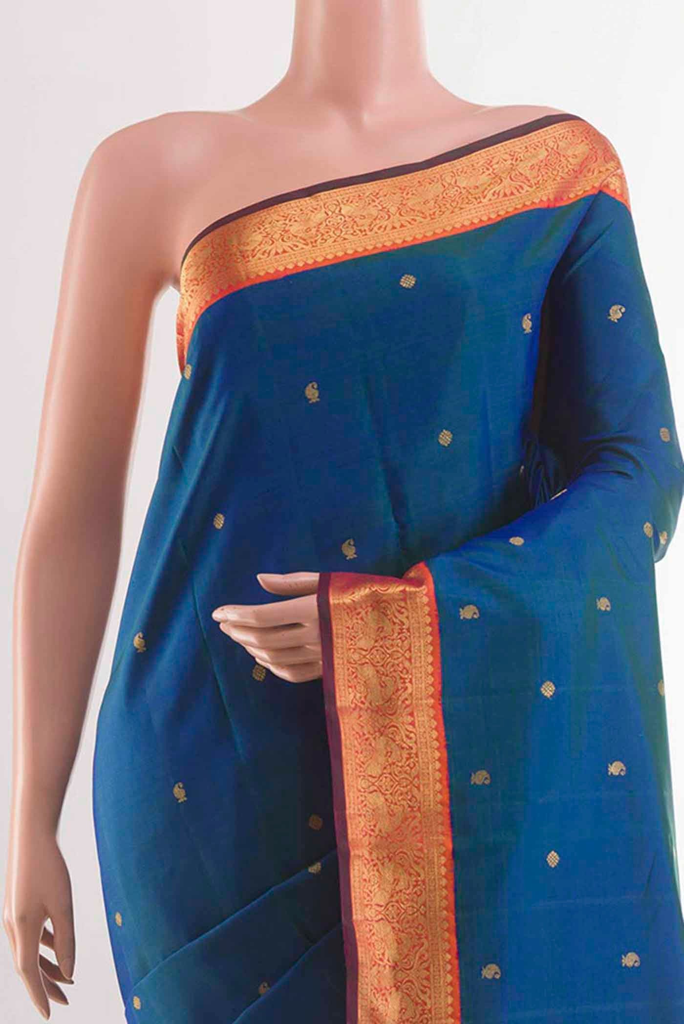 Border image of Peacock Blue Kanchipuram Silk Saree with Zari Butta on the body and Zari Border