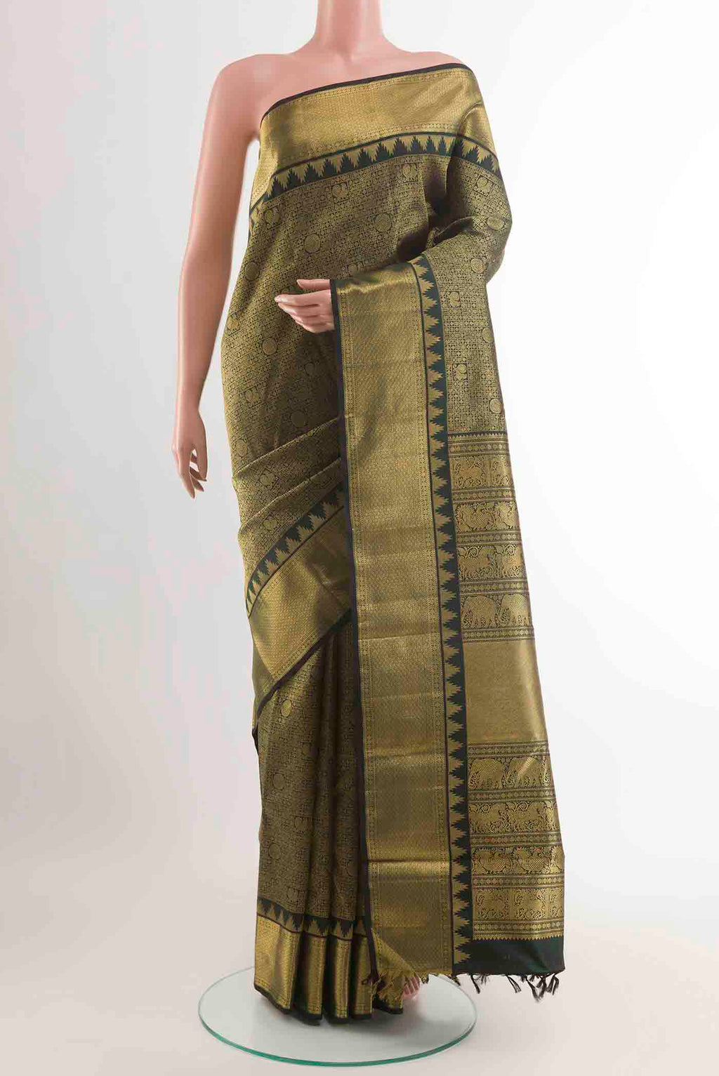 Pure Silk Pure Zari Black Kanchipuram Saree with Zari Brocade on the body and Zari Border displayed on a mannequin