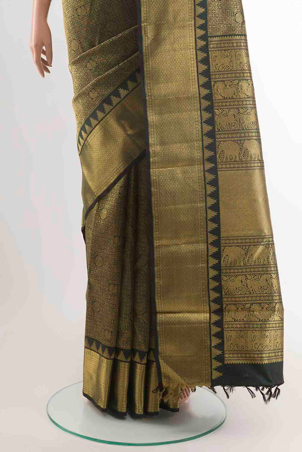Pleats and pallu of Pure Silk Pure Zari Black Kanchipuram Saree with Zari Brocade on the body and Zari Border
