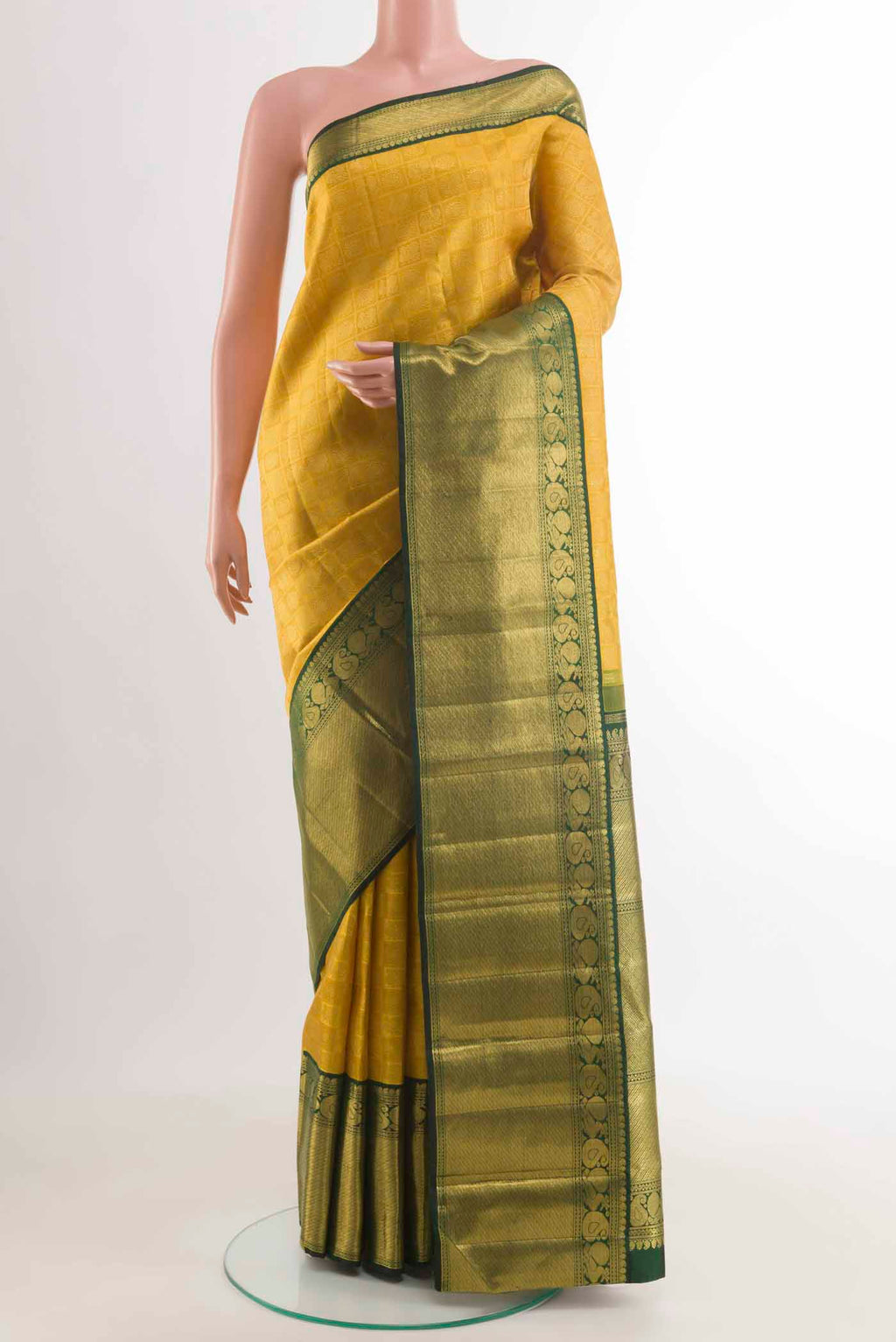Pure Silk Pure Zari Yellow Kanchipuram Saree with Zari Brocade on the body and Zari Border displayed on a mannequin