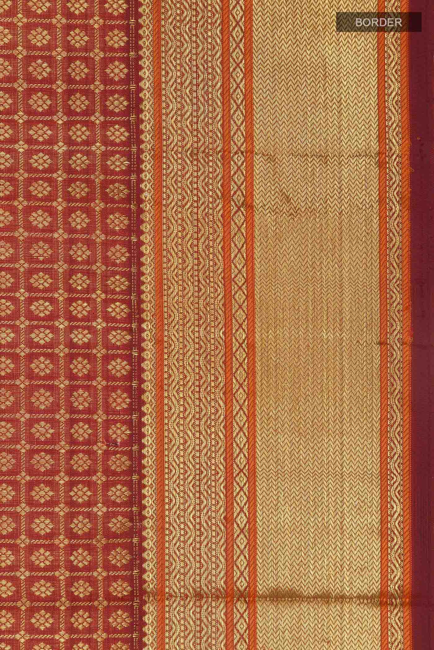 Border image of Maroon Kanchipuram Silk Saree with Zari Brocade on the body and Zari Border