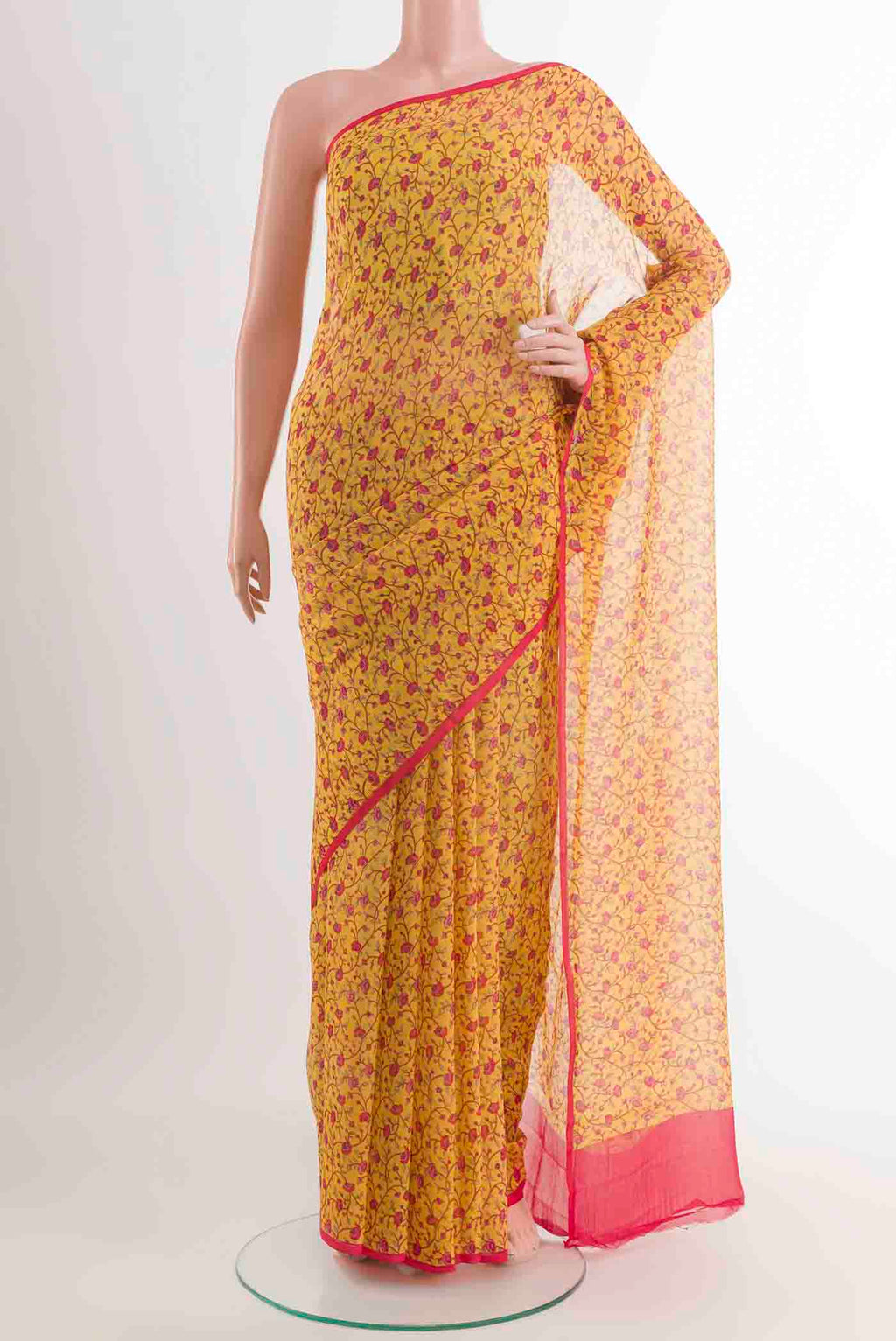 Yellow Mysore Chiffon Saree with Printed design on the body and Plain Border displayed on a mannequin