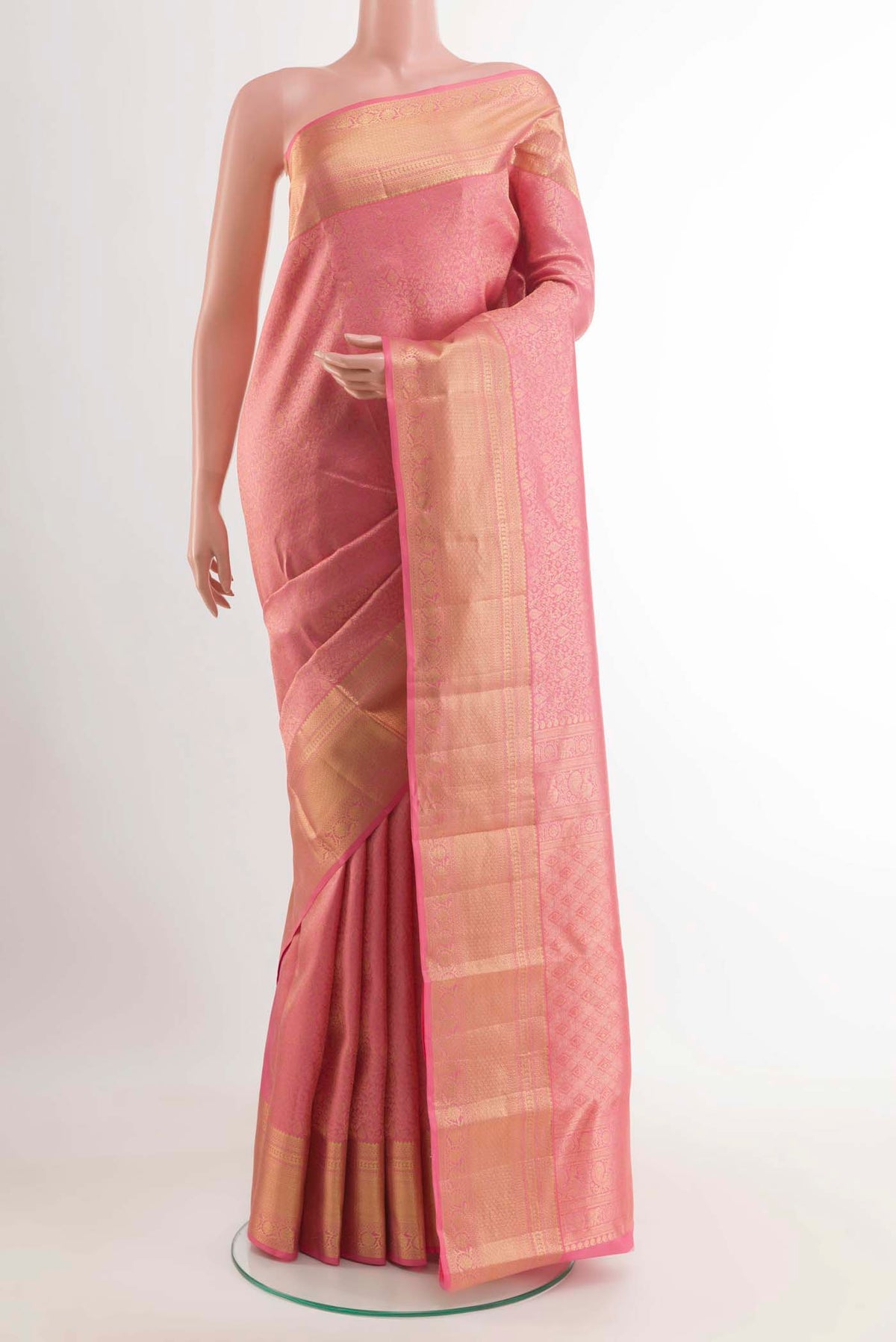 Pink Kanchipuram Silk Saree with Zari Brocade on the body and Zari Border displayed on a mannequin