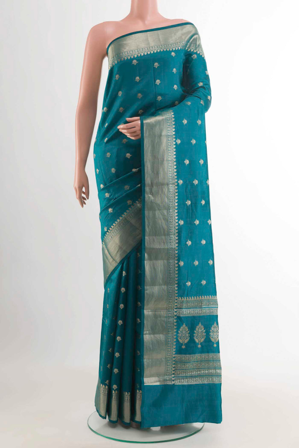 Blue Banarasi Raw Silk Saree with Zari Butta on the body and Zari Border displayed on a mannequin
