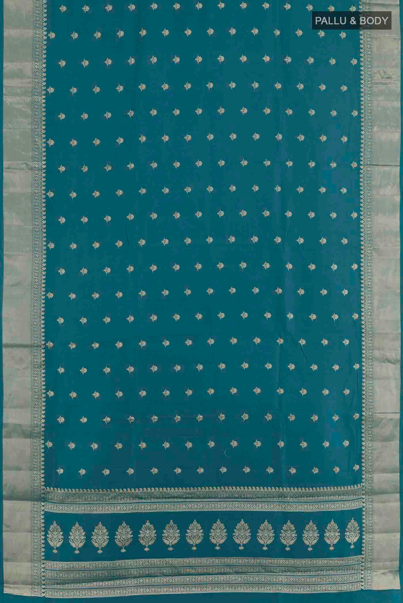 Flat view of Blue Banarasi Raw Silk Saree with Zari Butta on the body and Zari Border
