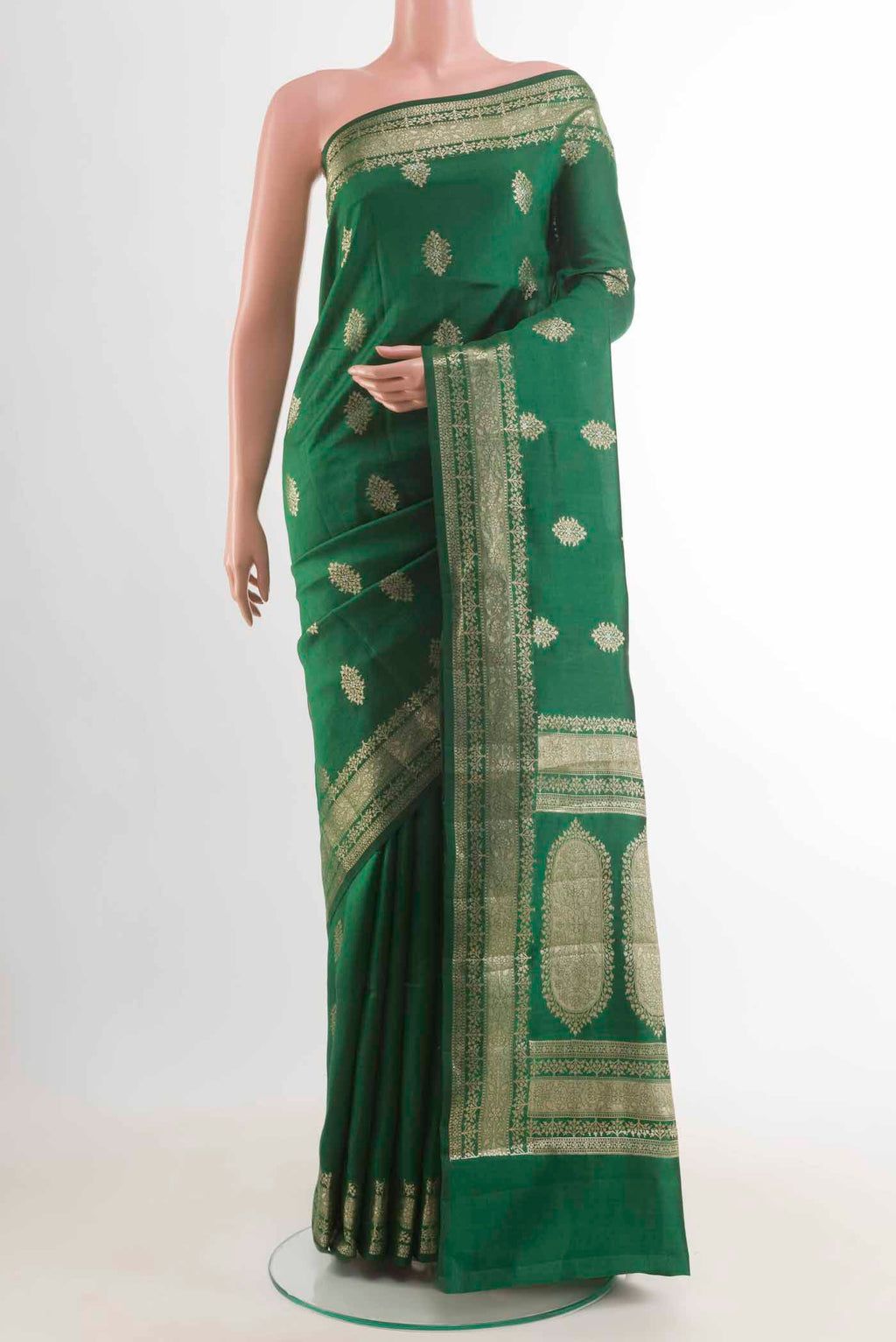 Green Banarasi Raw Silk Saree with Zari Butta on the body and Zari Border displayed on a mannequin