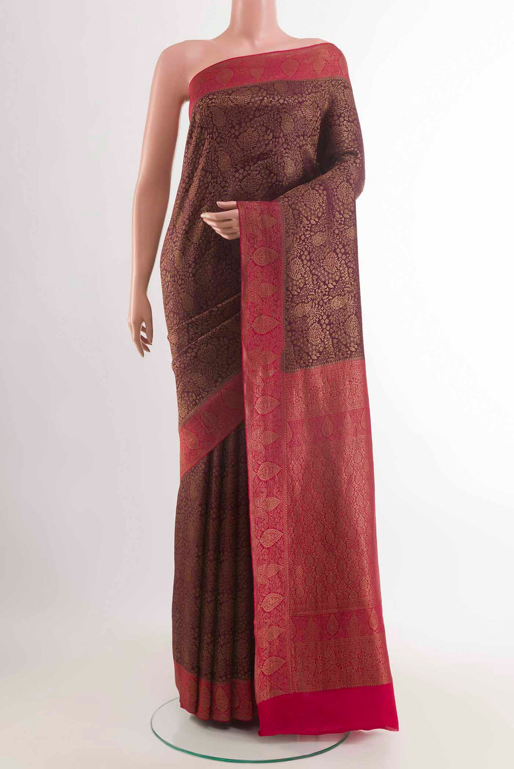 Brown Mysore Crepe Saree with Zari Brocade on the body and Zari Border displayed on a mannequin