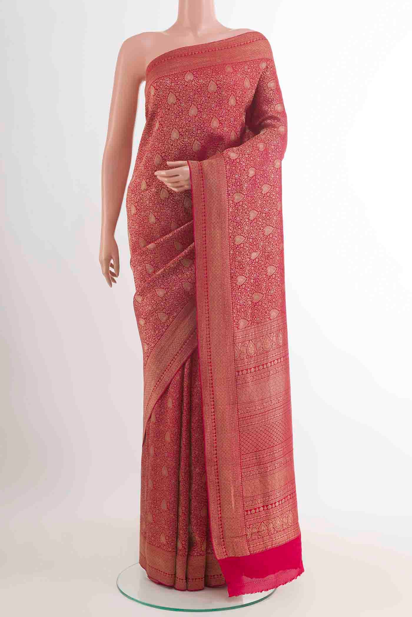 Dark Pink Mysore Crepe Saree with Zari Brocade on the body and Zari Border displayed on a mannequin
