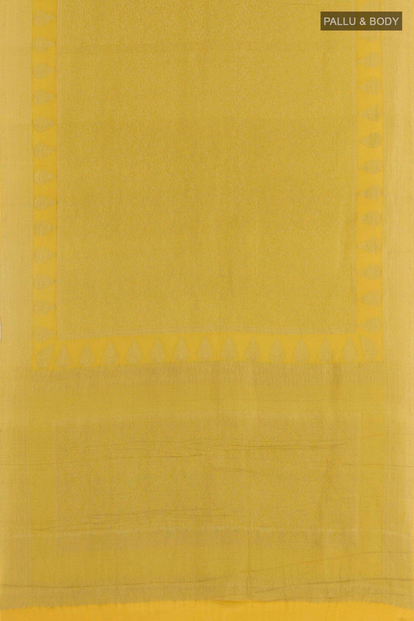 Flat view of Yellow Mysore Crepe Saree with Zari Brocade on the body and Zari Border
