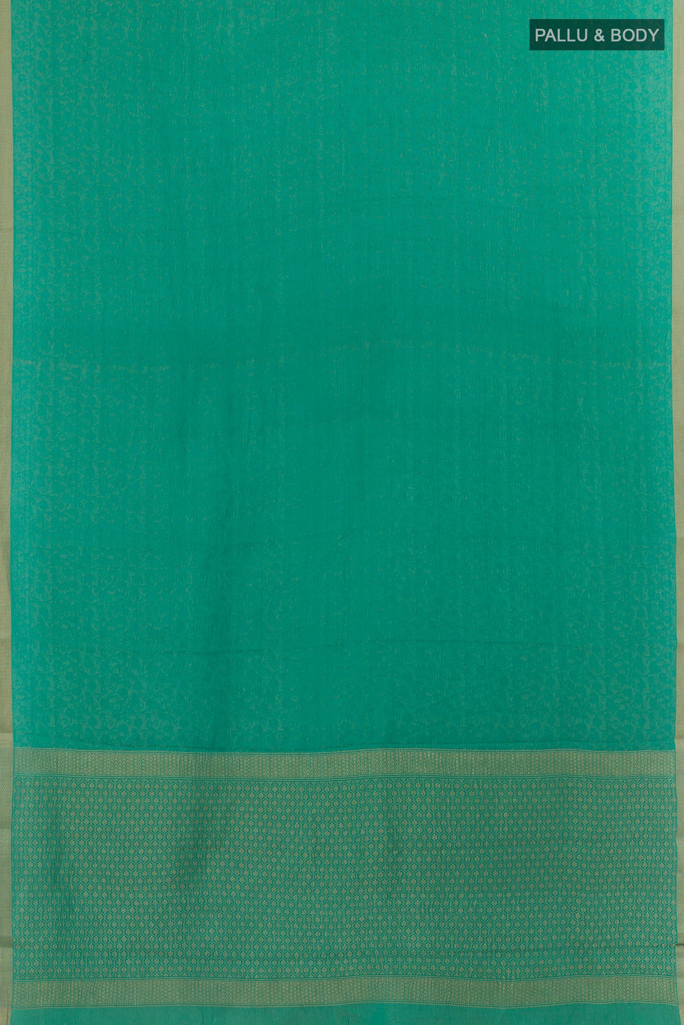 Flat view of Sea Green Mysore Crepe Saree with Zari Brocade on the body and Zari Border. 
