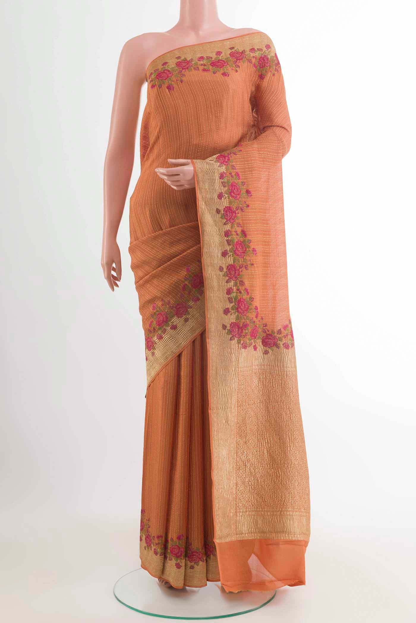 Orange Mysore Crepe Saree with Stripes on the body and Embroidery Border displayed on a mannequin
