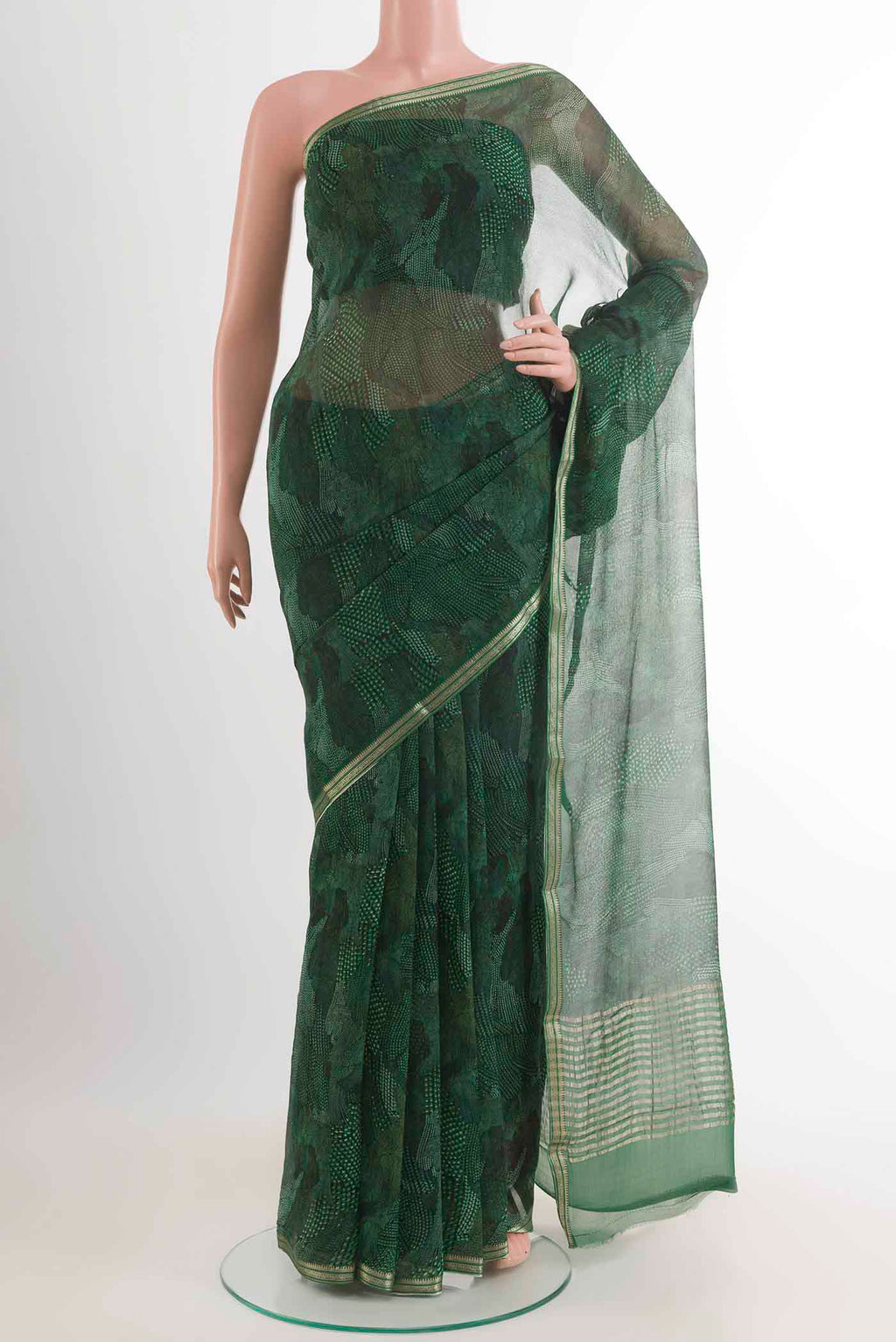Green Mysore Chiffon Saree with Printed design on the body and Zari Border displayed on a mannequin