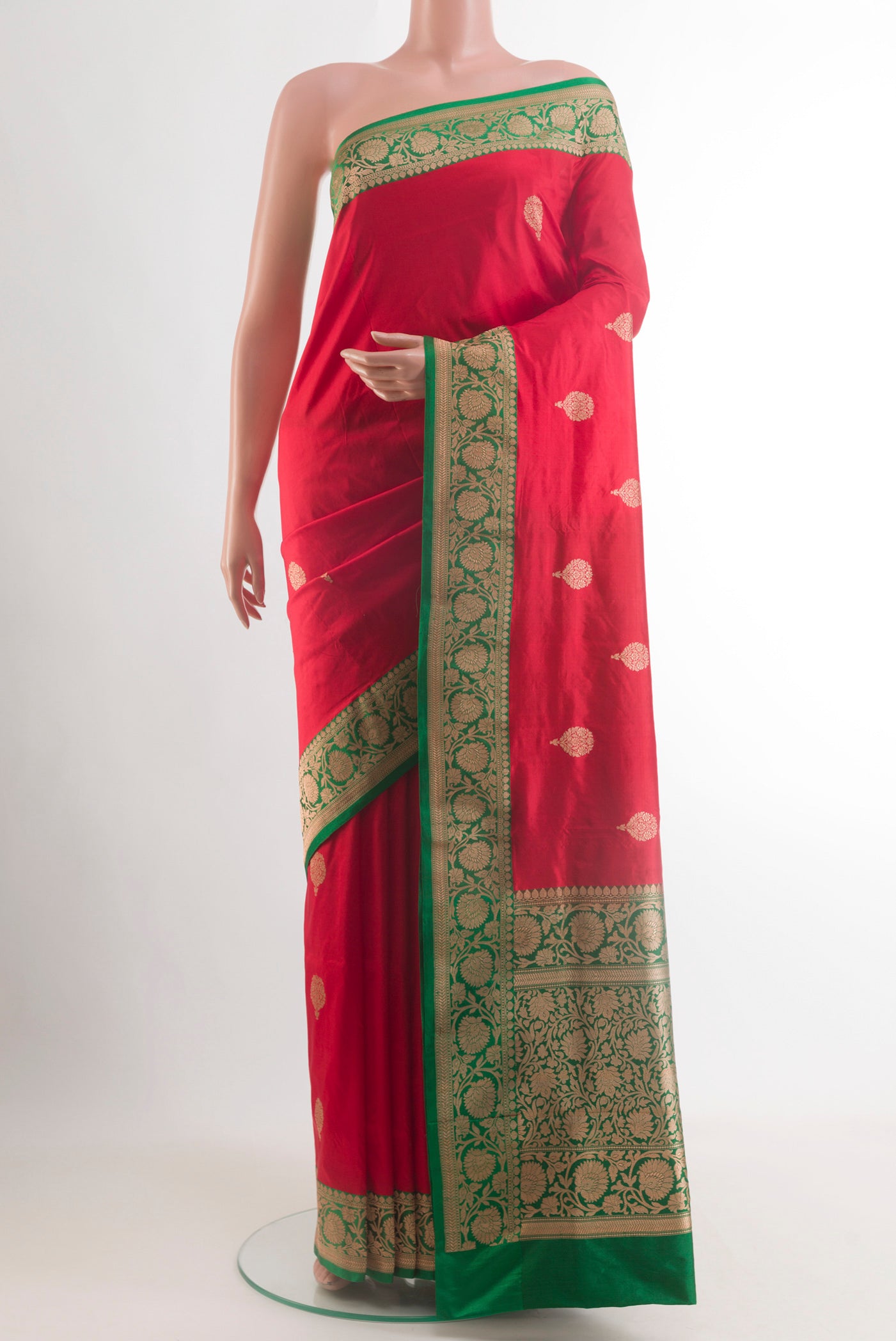 Red Banarasi Katan Silk Saree with Zari Butta on the body and Zari Border.  displayed on a mannequin