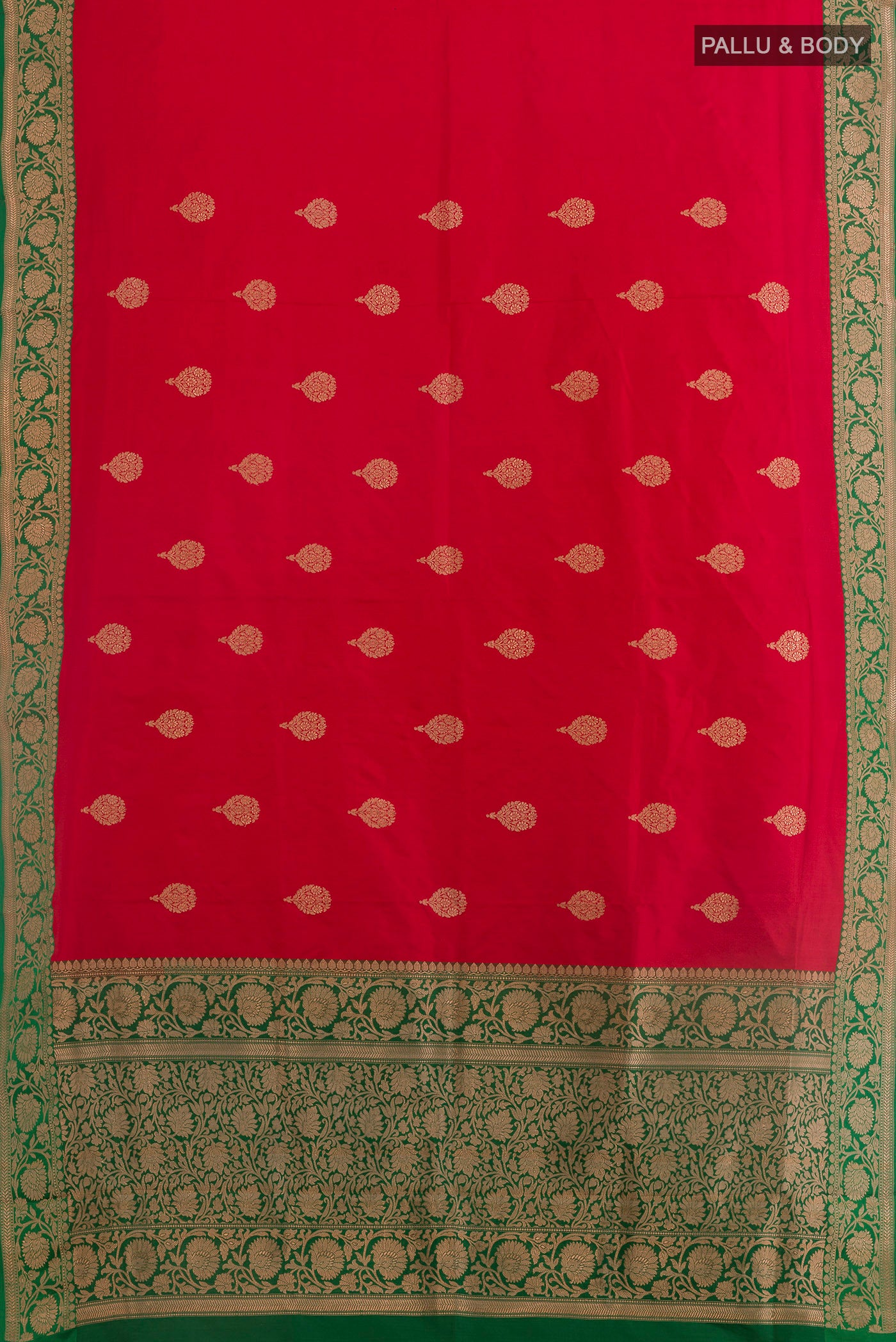 Flat view of Red Banarasi Katan Silk Saree with Zari Butta on the body and Zari Border. 