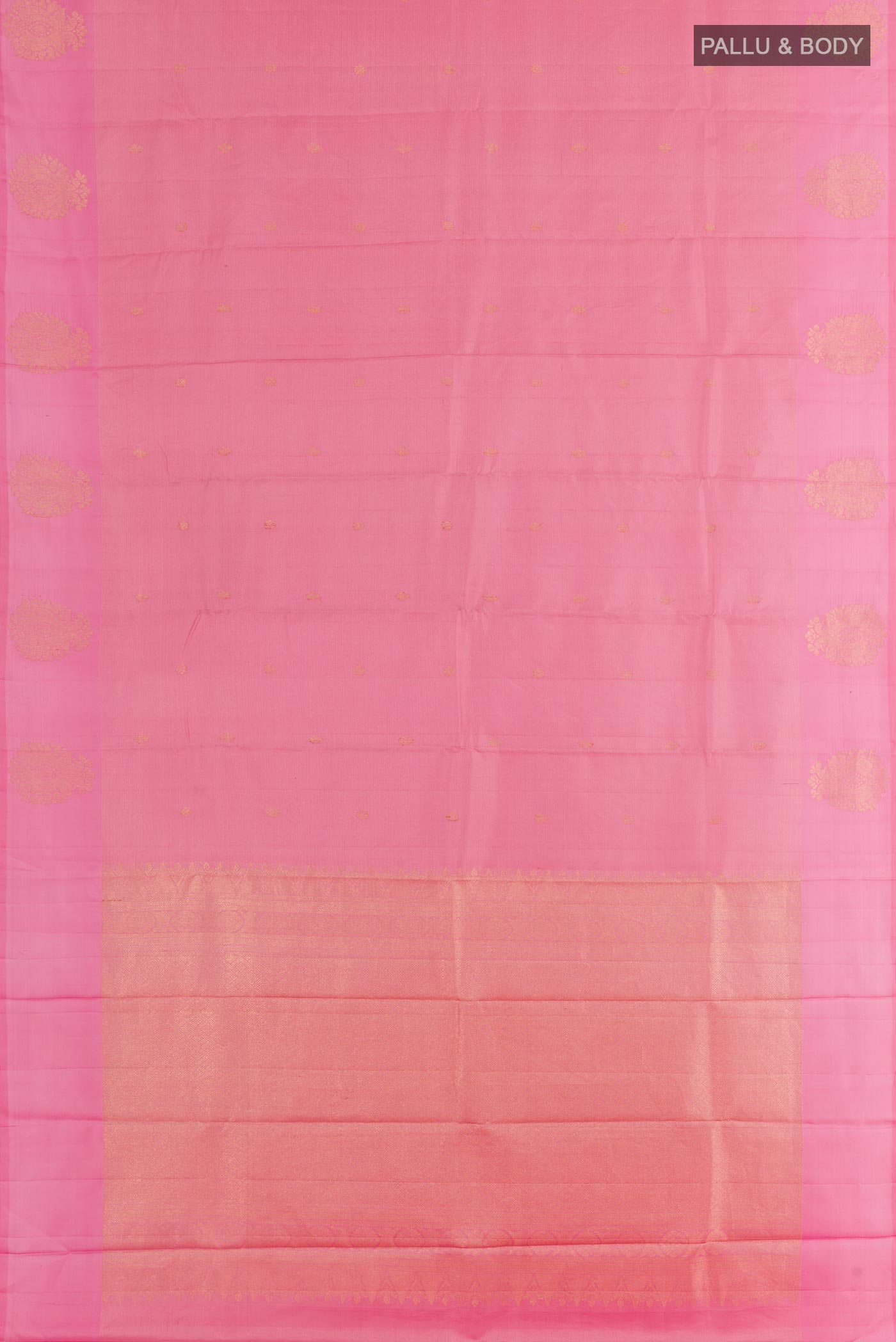 Flat view of Pink Kanchipuram Silk Saree with Zari Butta on the body and Zari Border. 
