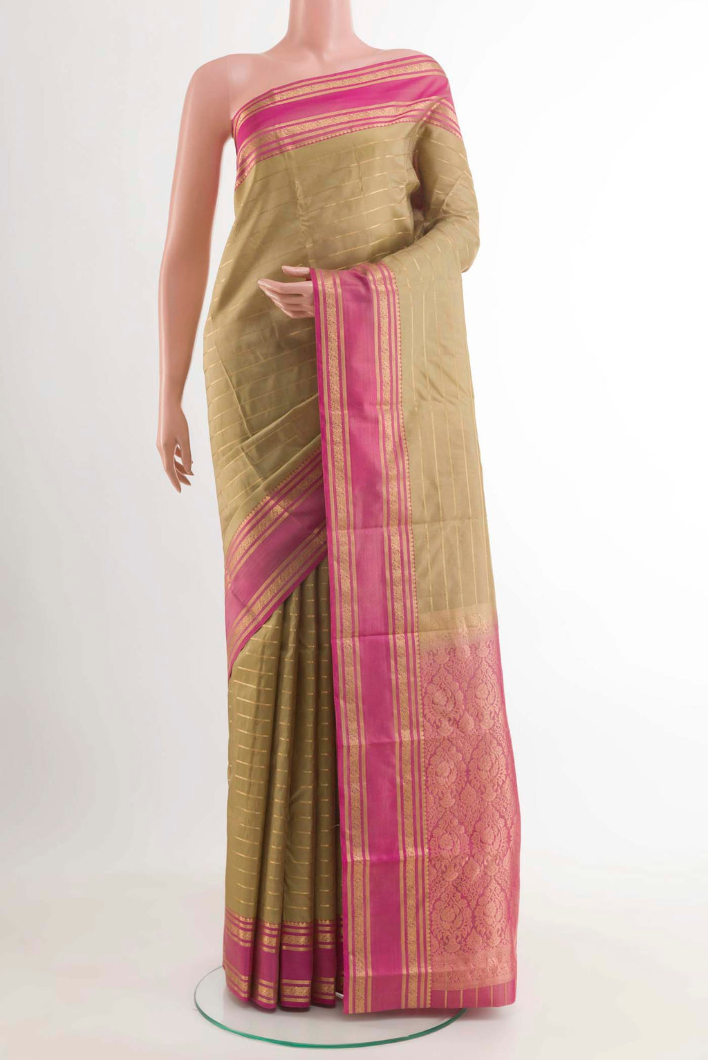 Sage Green Kanchipuram Silk Saree with Stripes on the body and Zari Border displayed on a mannequin