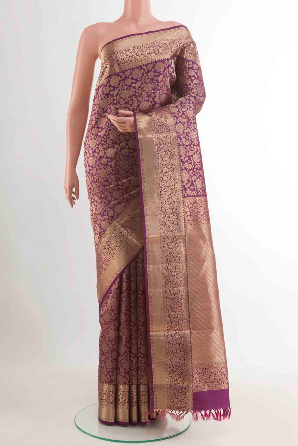 Purple Soft Silk Saree with Zari Brocade on the body and Zari Border displayed on a mannequin