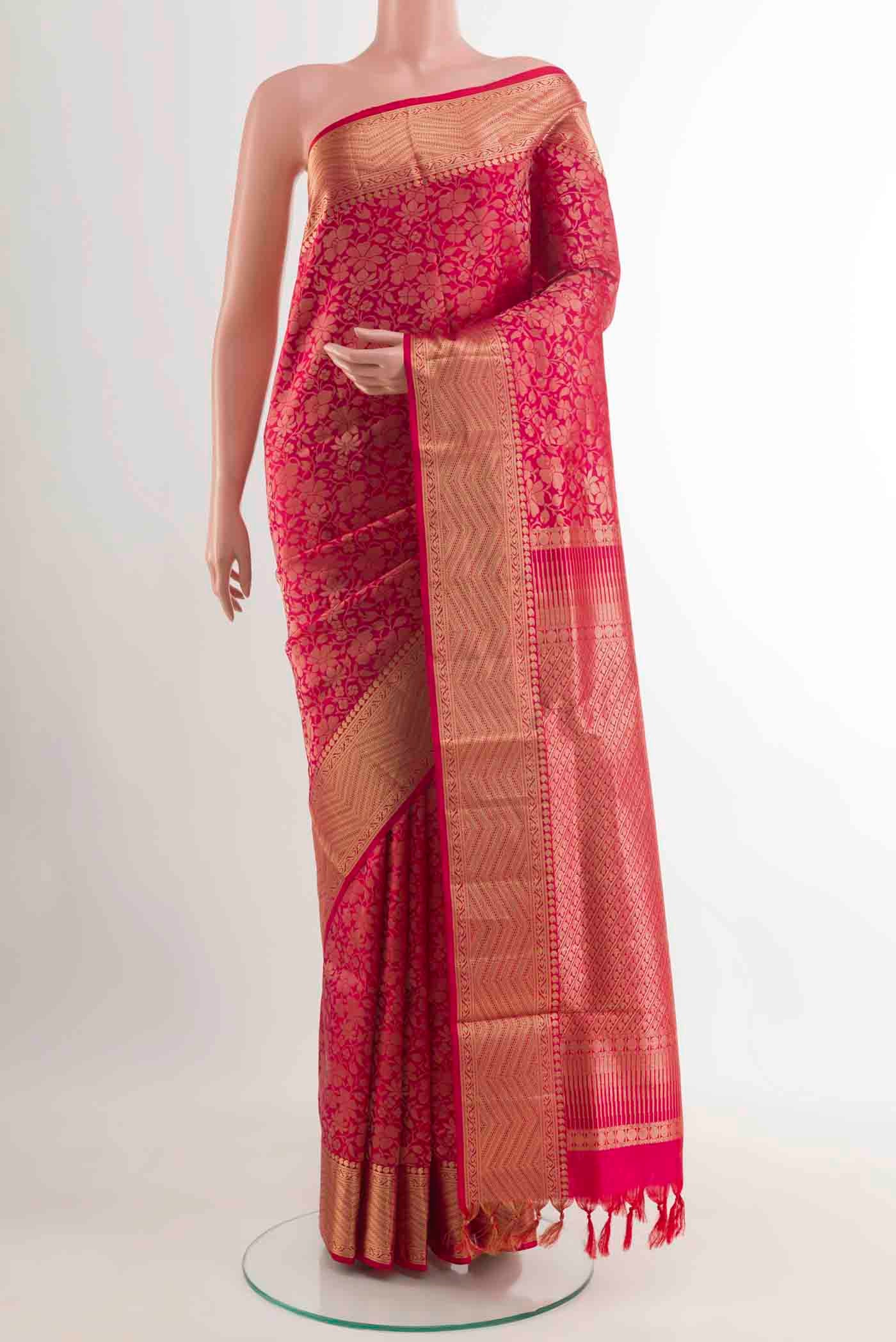 Dark Pink Soft Silk Saree with Zari Brocade on the body and Zari Border displayed on a mannequin