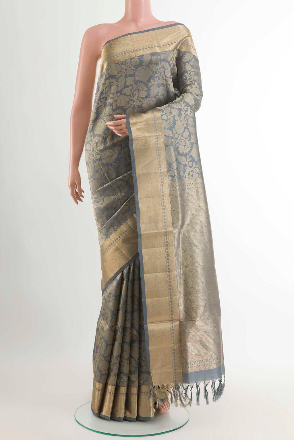 Grey Soft Silk Saree with Zari Brocade on the body and Zari Border displayed on a mannequin