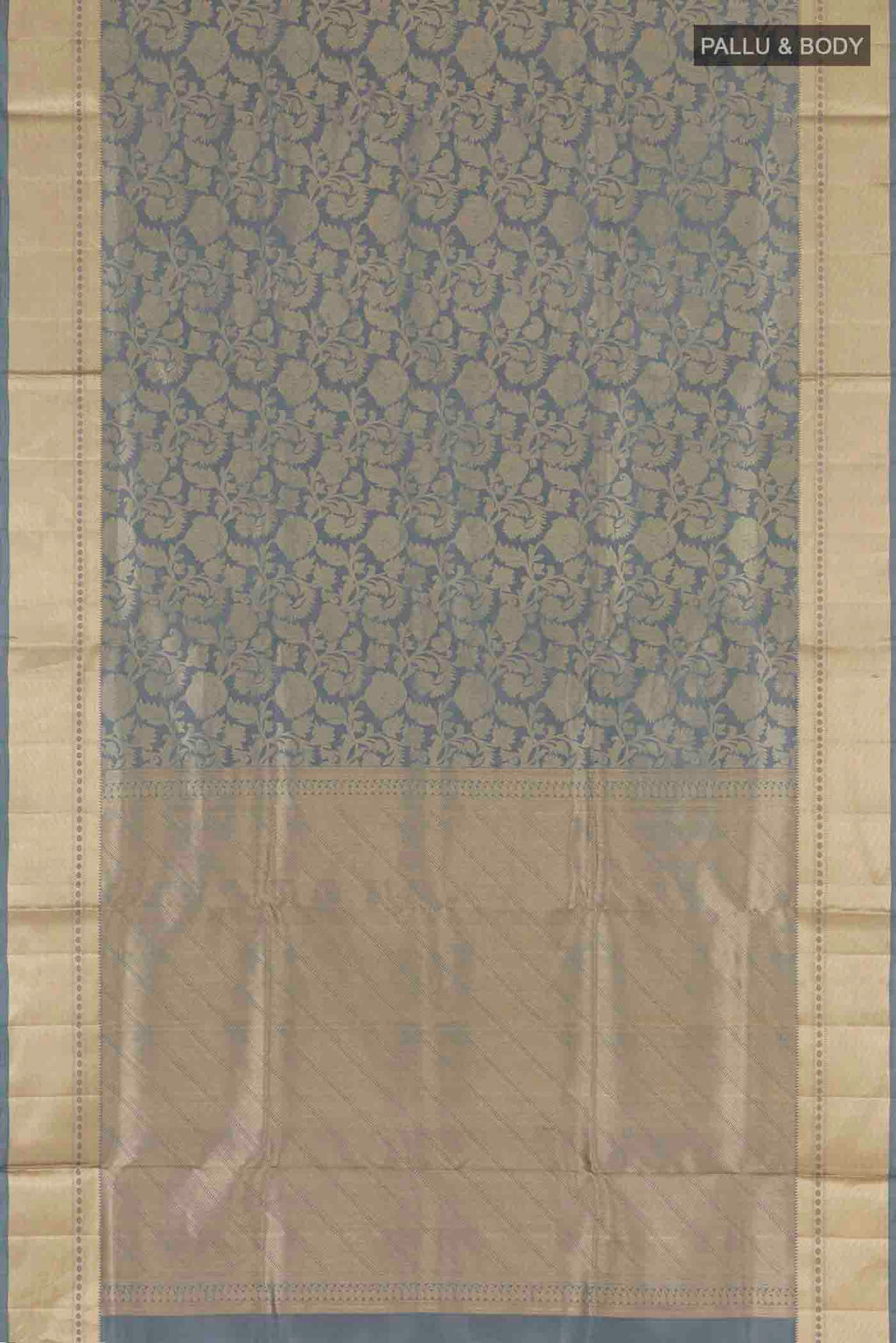 Flat view of Grey Soft Silk Saree with Zari Brocade on the body and Zari Border