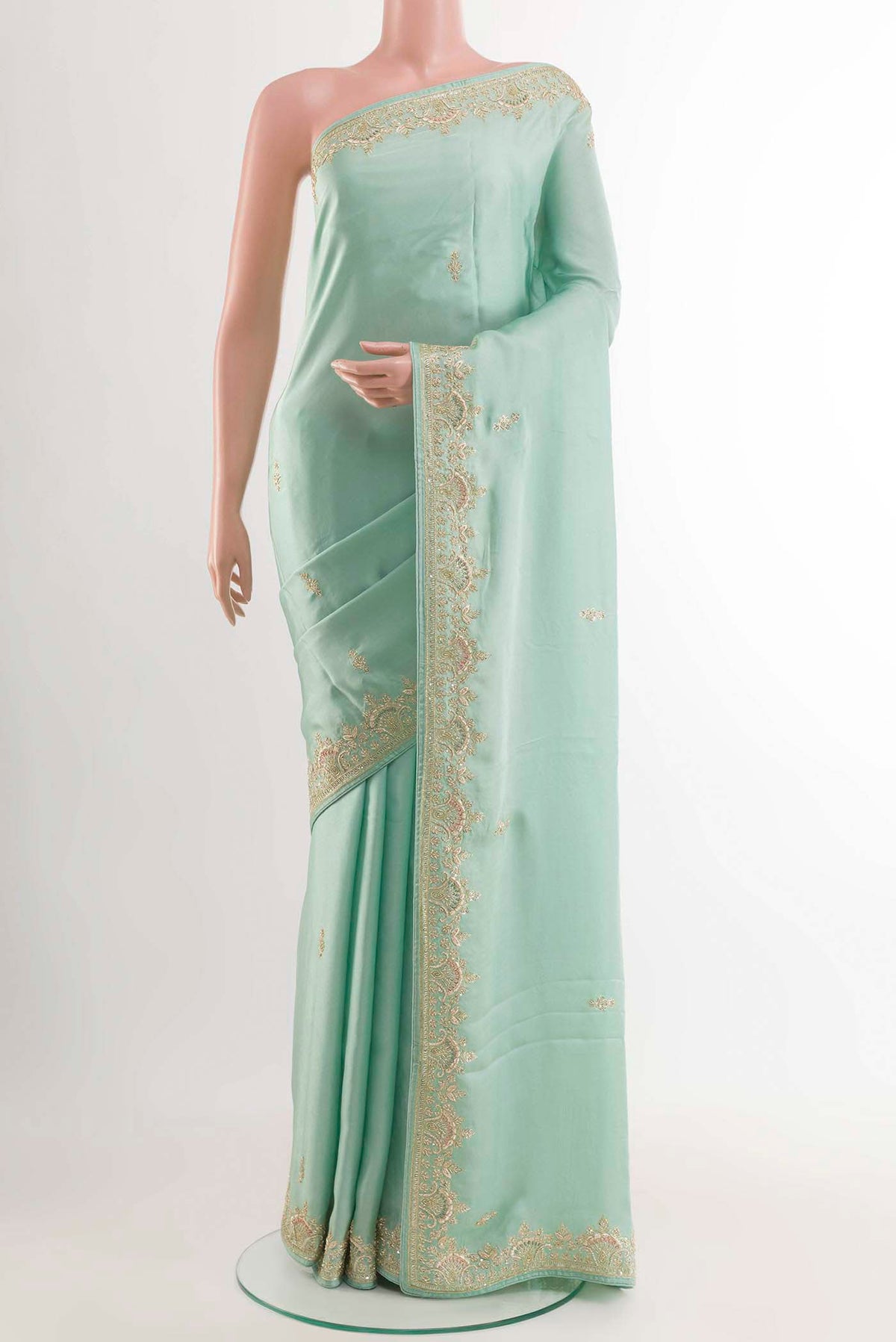 Blue Satin Crepe Saree with Embroidery on the body and Embroidery Border displayed on a mannequin