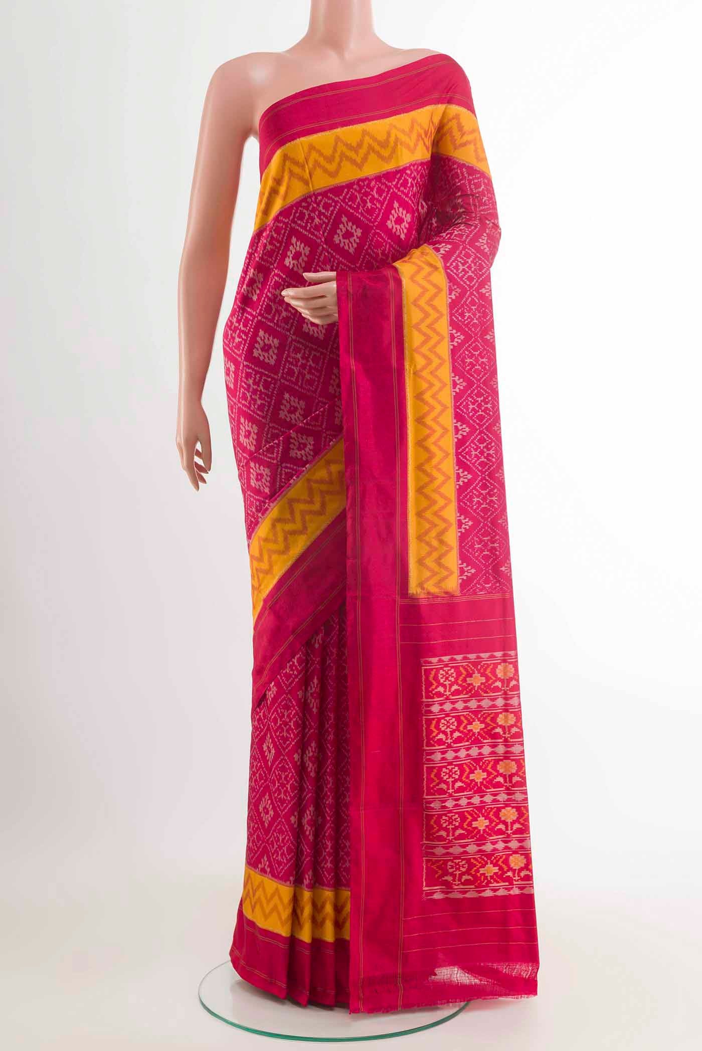 Pink Pochampally Silk Saree with Pure Ikat on the body and Plain Border displayed on a mannequin