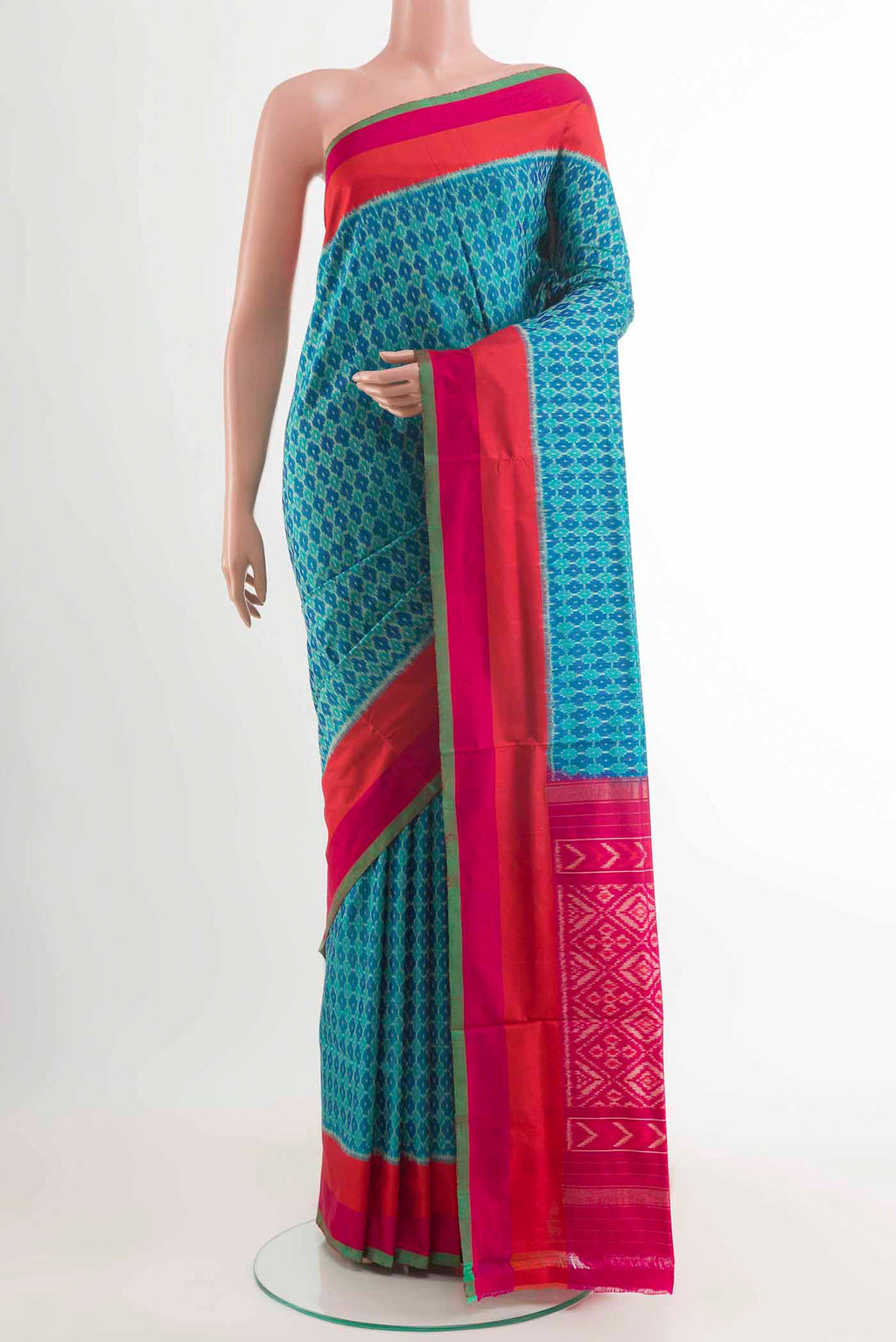 Blue Pochampally Silk Saree with Pure Ikat on the body and Zari Border displayed on a mannequin