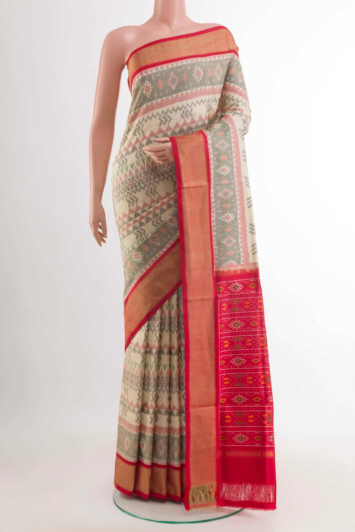 Cream Pochampally Silk Saree with Pure Ikat on the body and Zari Border displayed on a mannequin