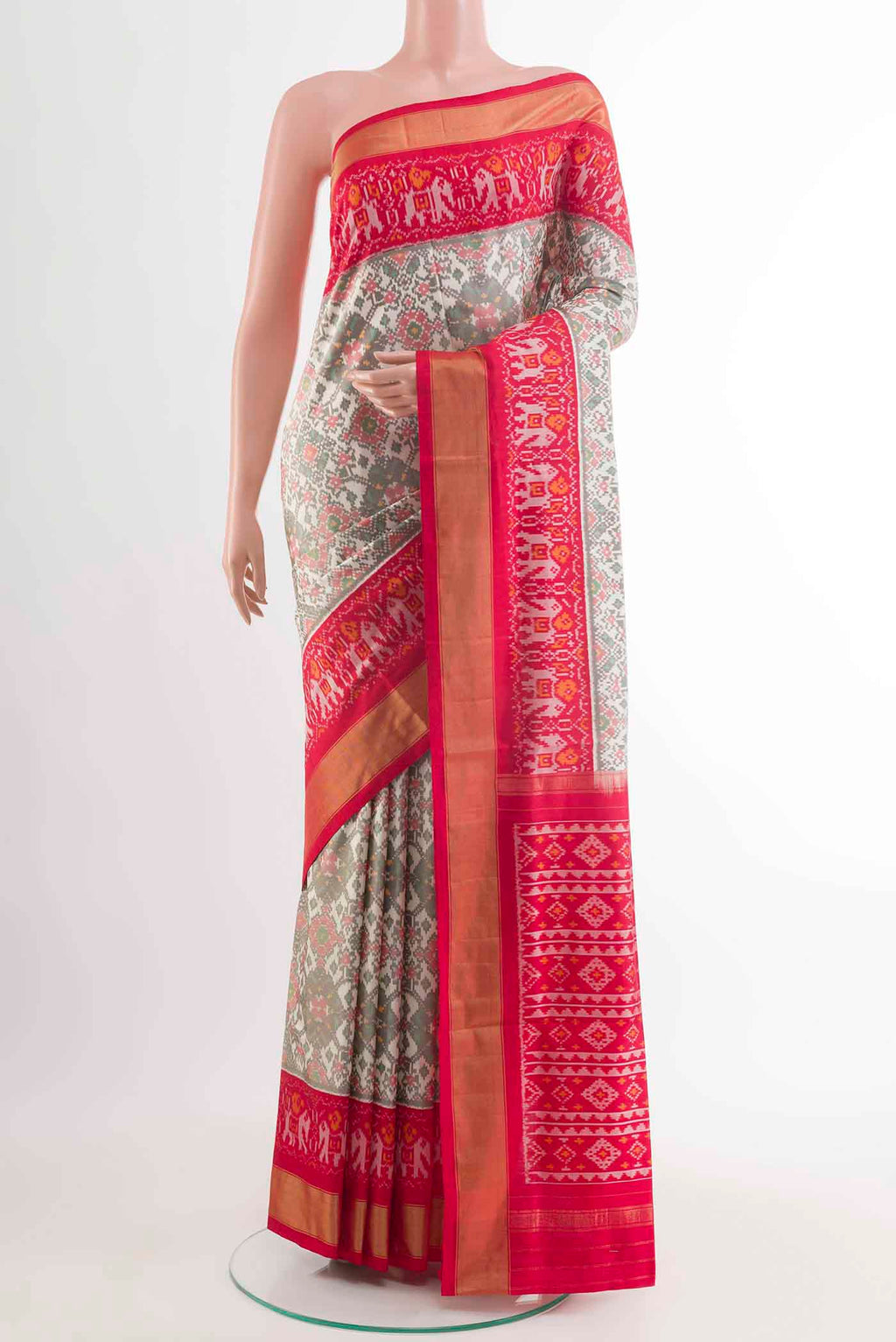 Off White Pochampally Silk Saree with Pure Ikat on the body and Zari Border displayed on a mannequin