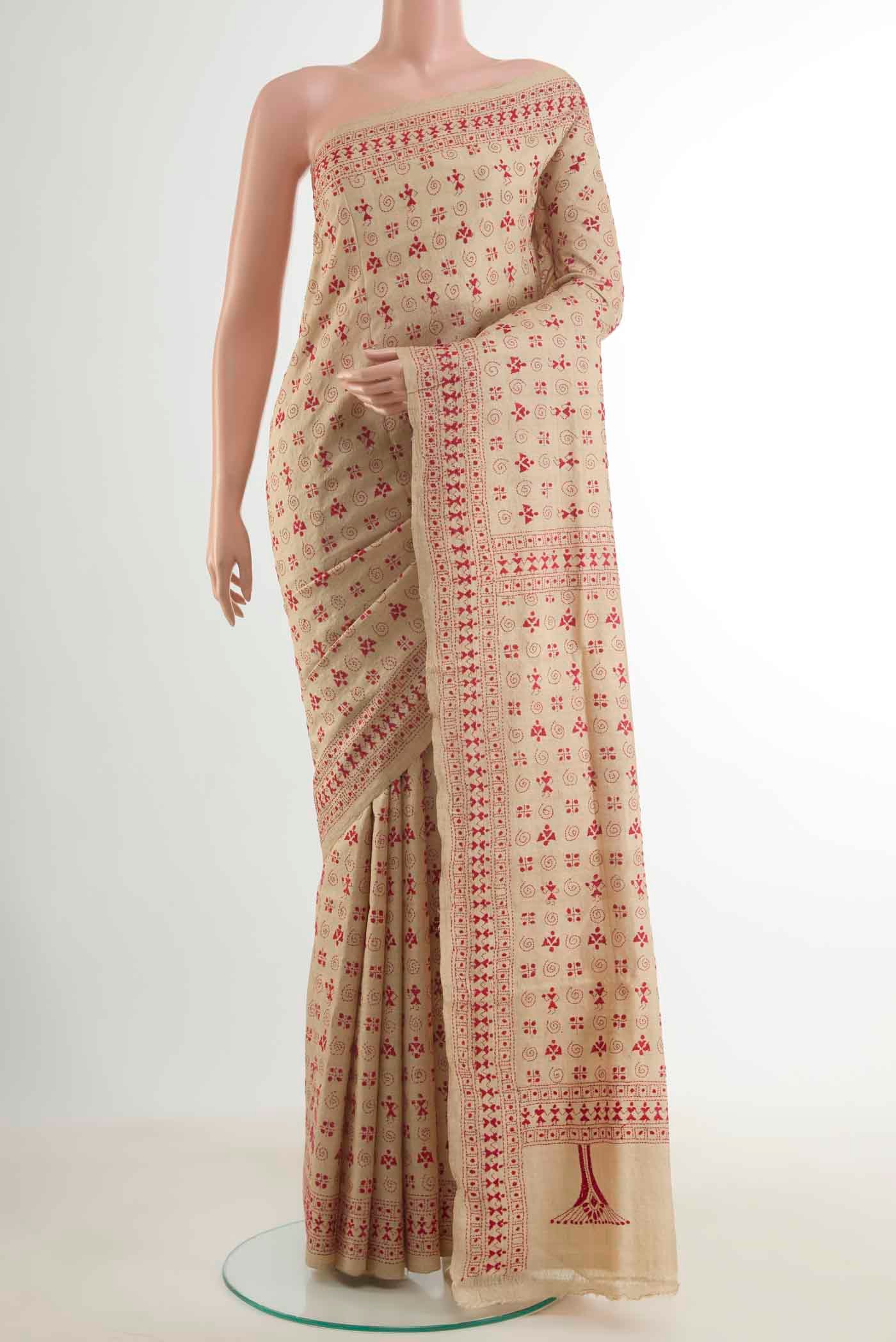 Beige Tussar Silk Saree with Kantha Work on the body and Embroidery Border displayed on a mannequin