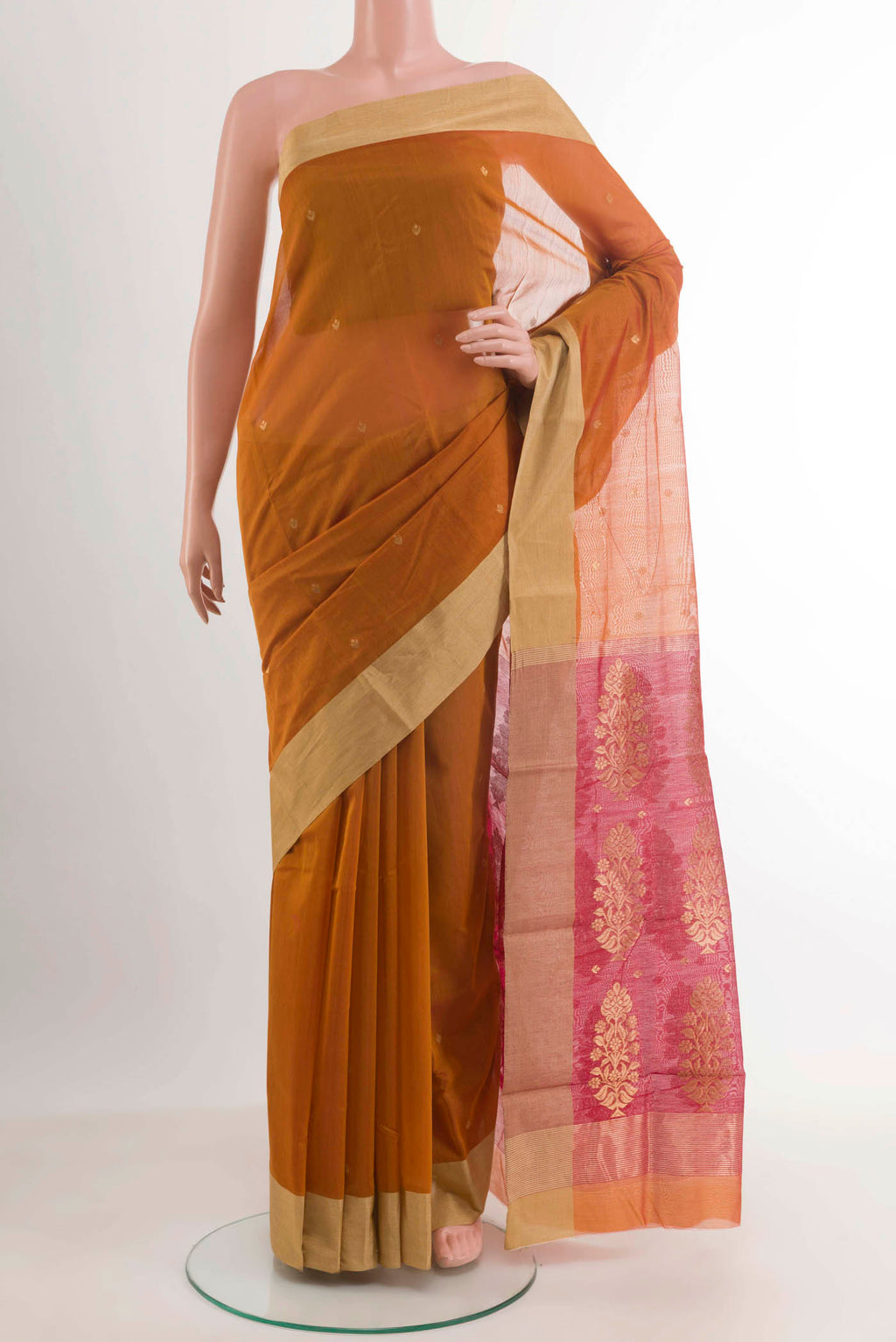 Orange Chanderi Silk Saree with Zari Butta on the body and Zari Border.  displayed on a mannequin