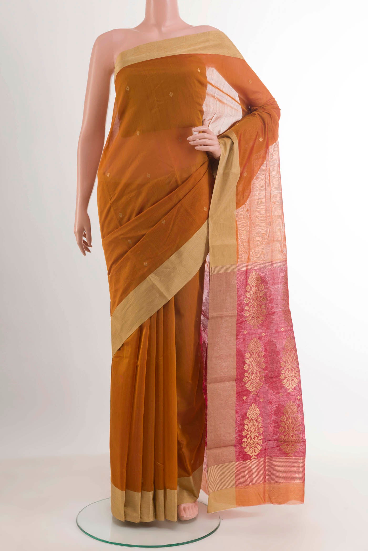 Orange Chanderi Silk Saree with Zari Butta on the body and Zari Border.  displayed on a mannequin
