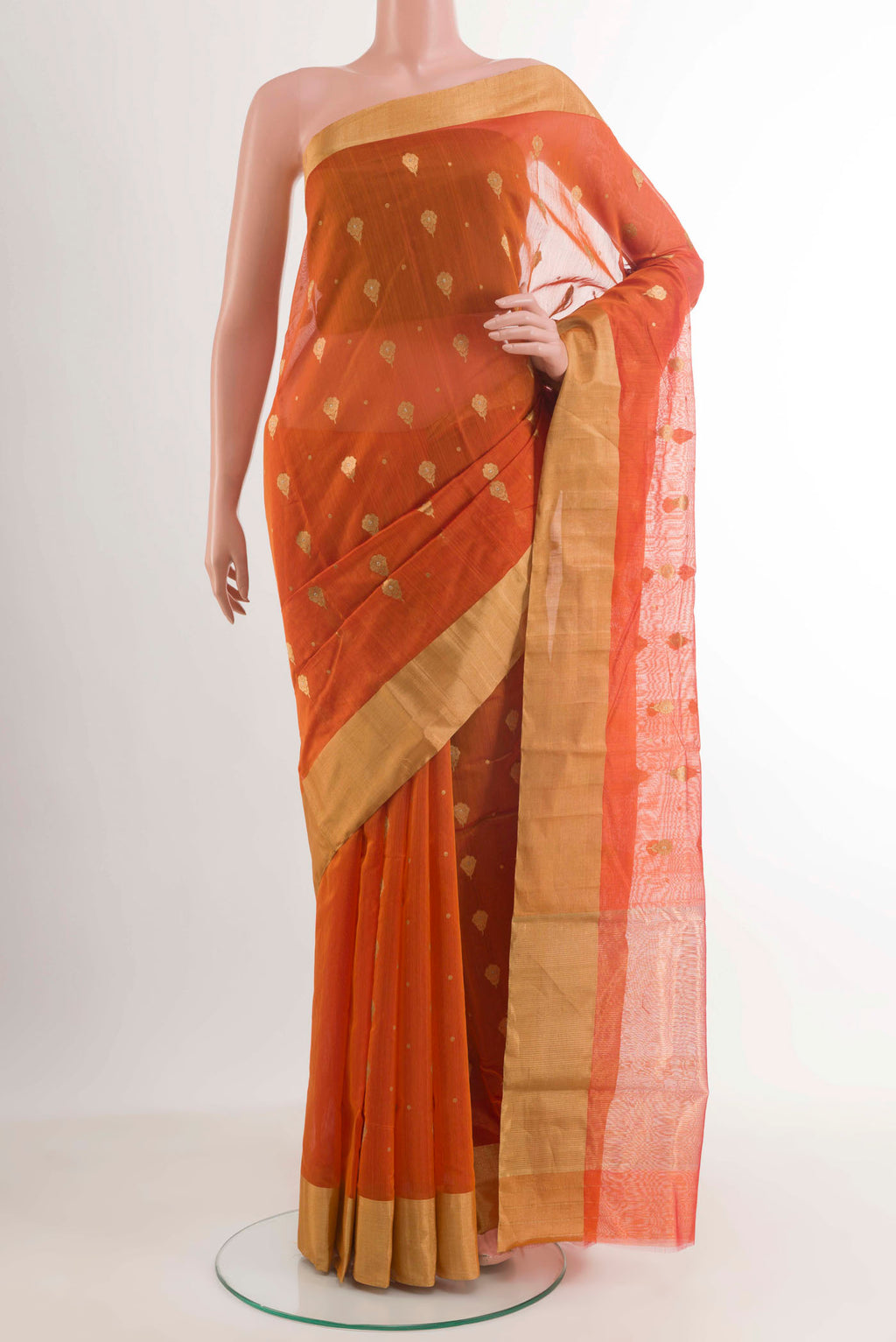 Orange Chanderi Silk Saree with Zari Butta on the body and Zari Border.  displayed on a mannequin