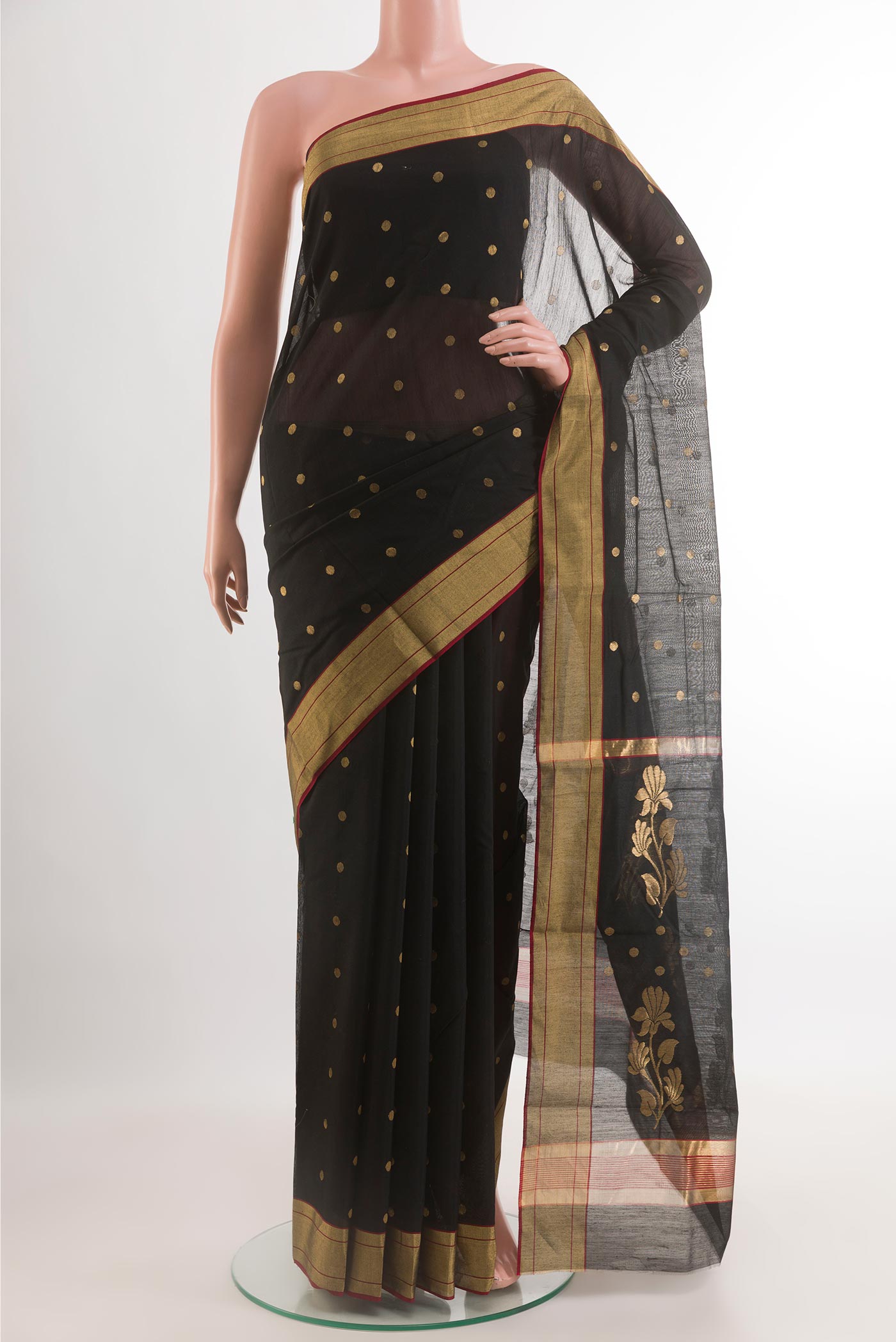 Black Blended Chanderi Silk Cotton Saree with Zari Butta on the body and Zari Border.  displayed on a mannequin