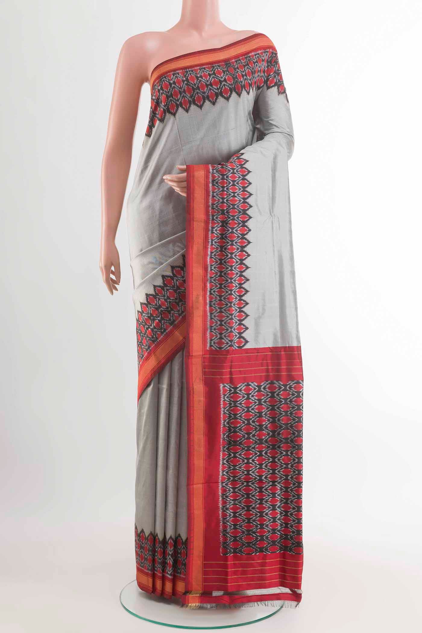 Grey Pochampally Silk Saree with Plain Body and Zari Border displayed on a mannequin