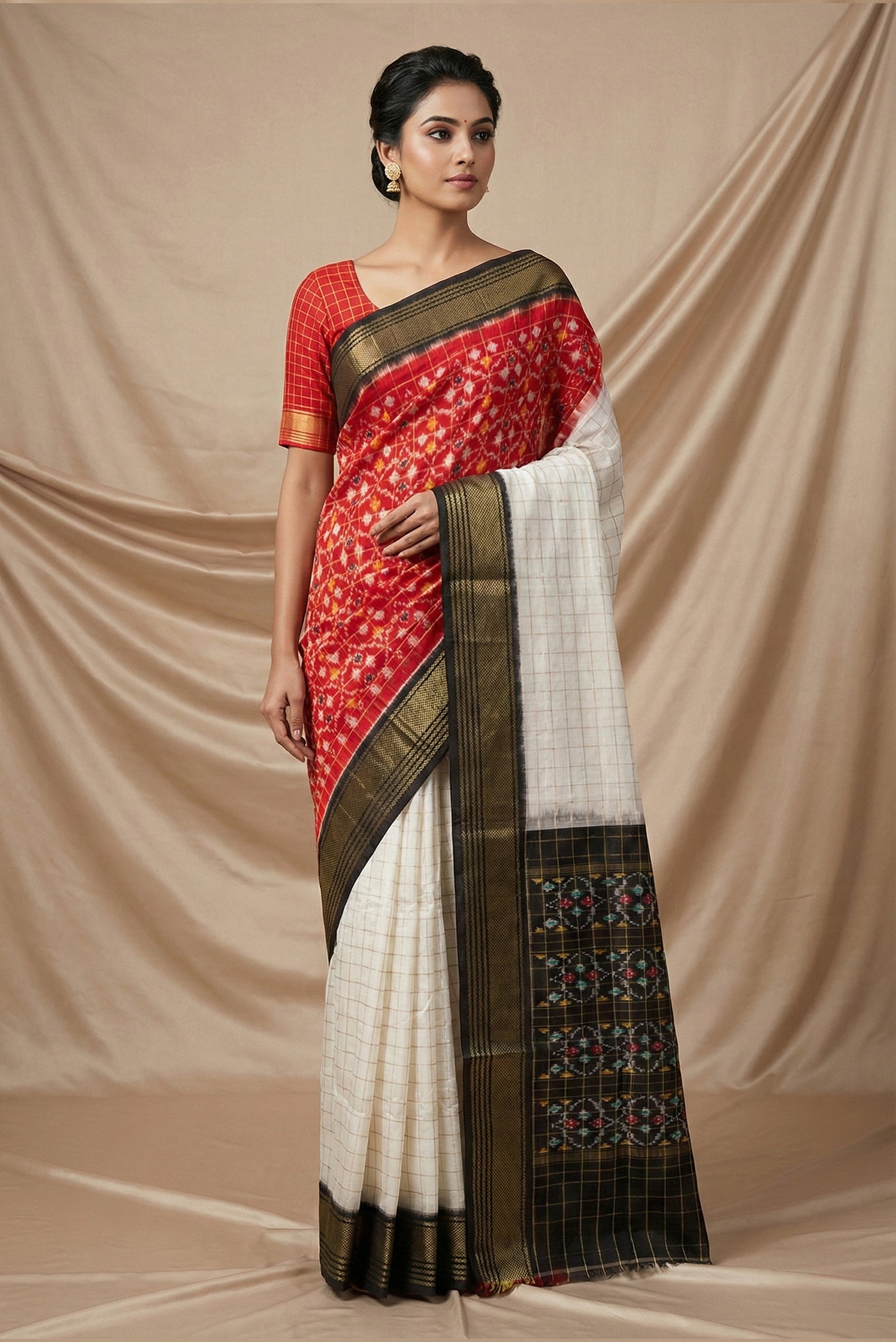 Model wearing a Multi Color Pochampally Silk Saree with Checked design on the body and Zari Border
