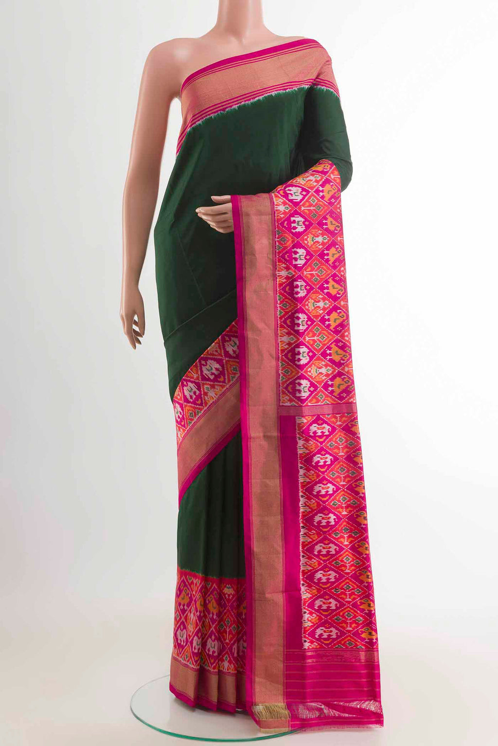 Bottle Green Pochampally Silk Saree with Plain Body and Zari Border displayed on a mannequin