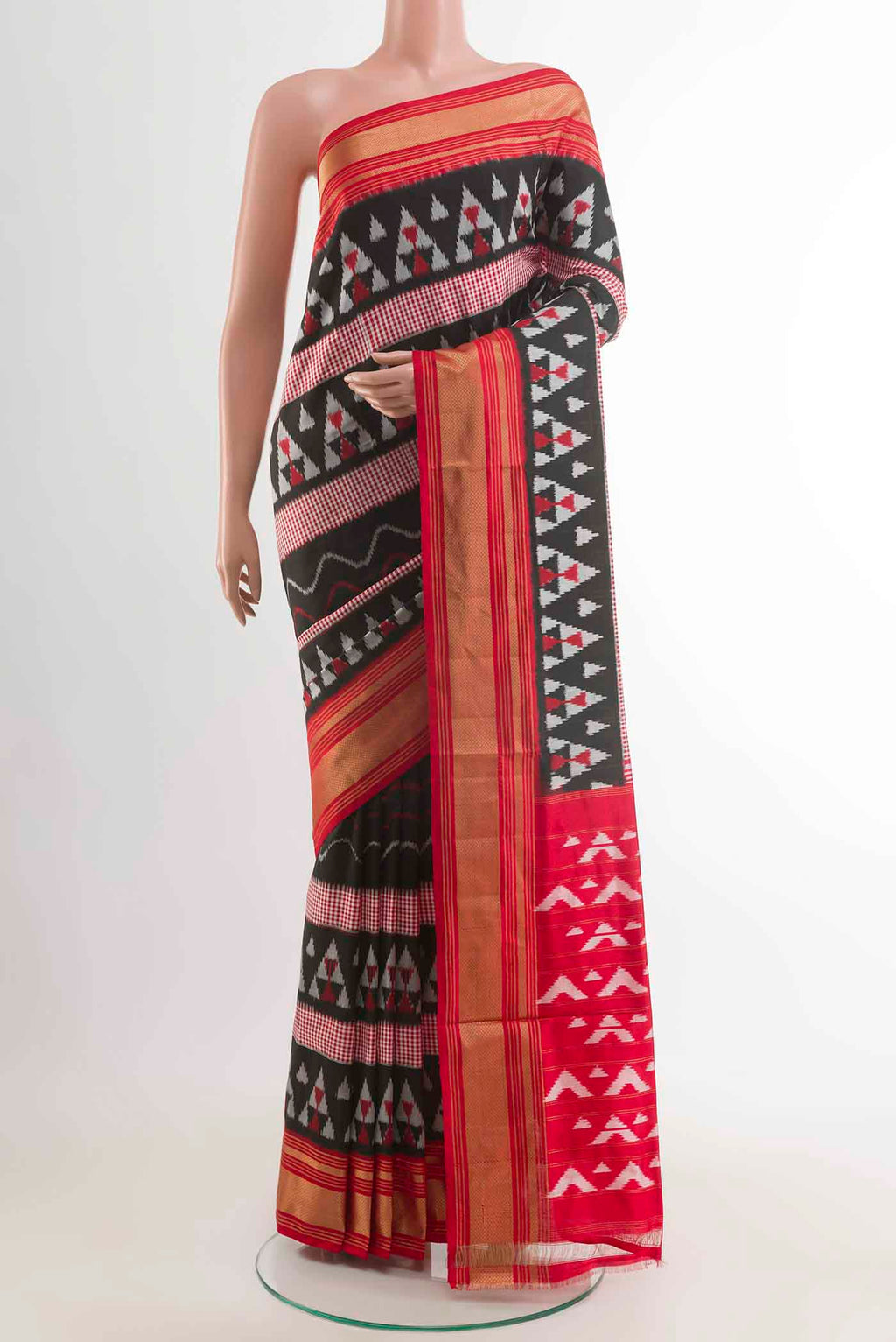 Black Pochampally Silk Saree with Pure Ikat on the body and Zari Border displayed on a mannequin