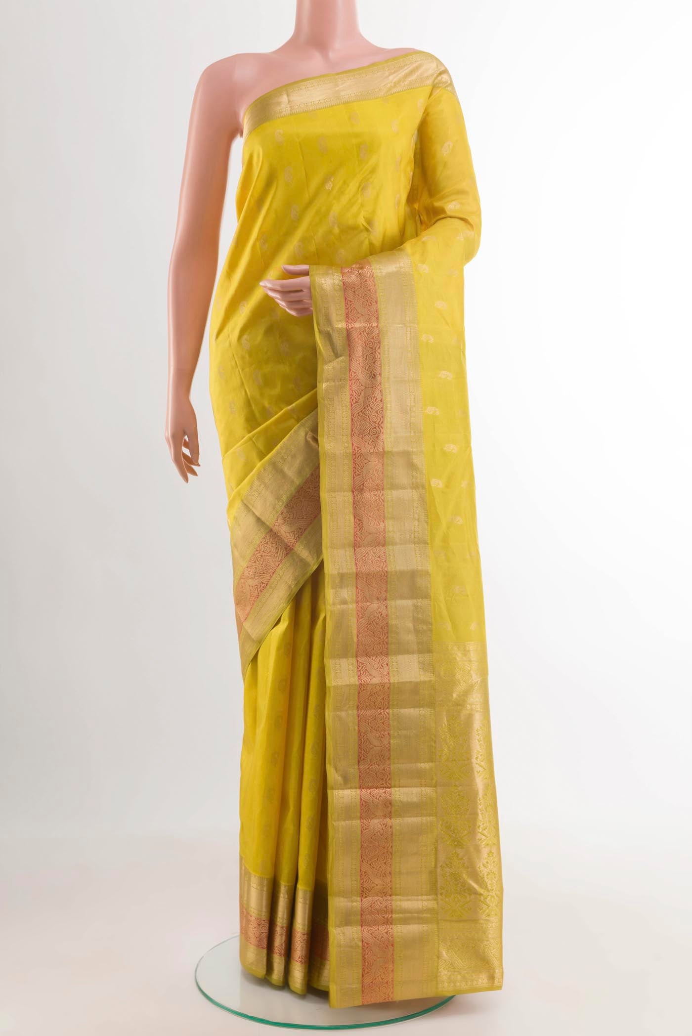 Lemon Yellow Kanchipuram Silk Saree with Zari Butta on the body and Zari Border displayed on a mannequin