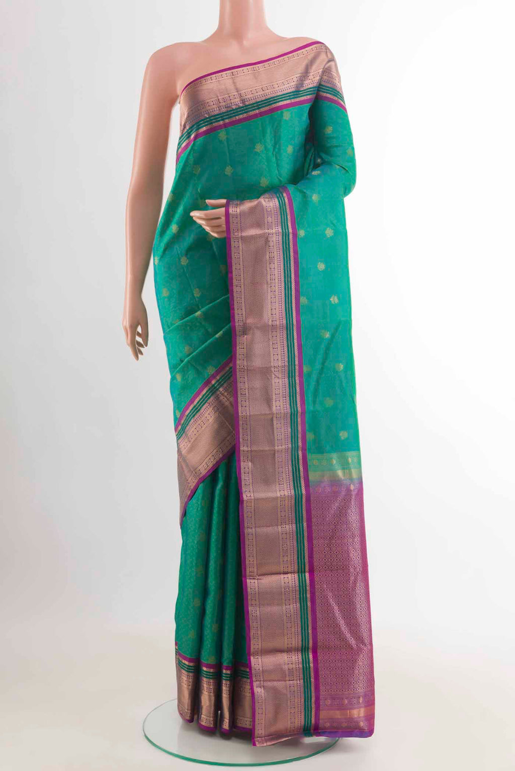 Turquoise Kanchipuram Silk Saree with Jacquard With Zari Butta on the body and Zari Border displayed on a mannequin