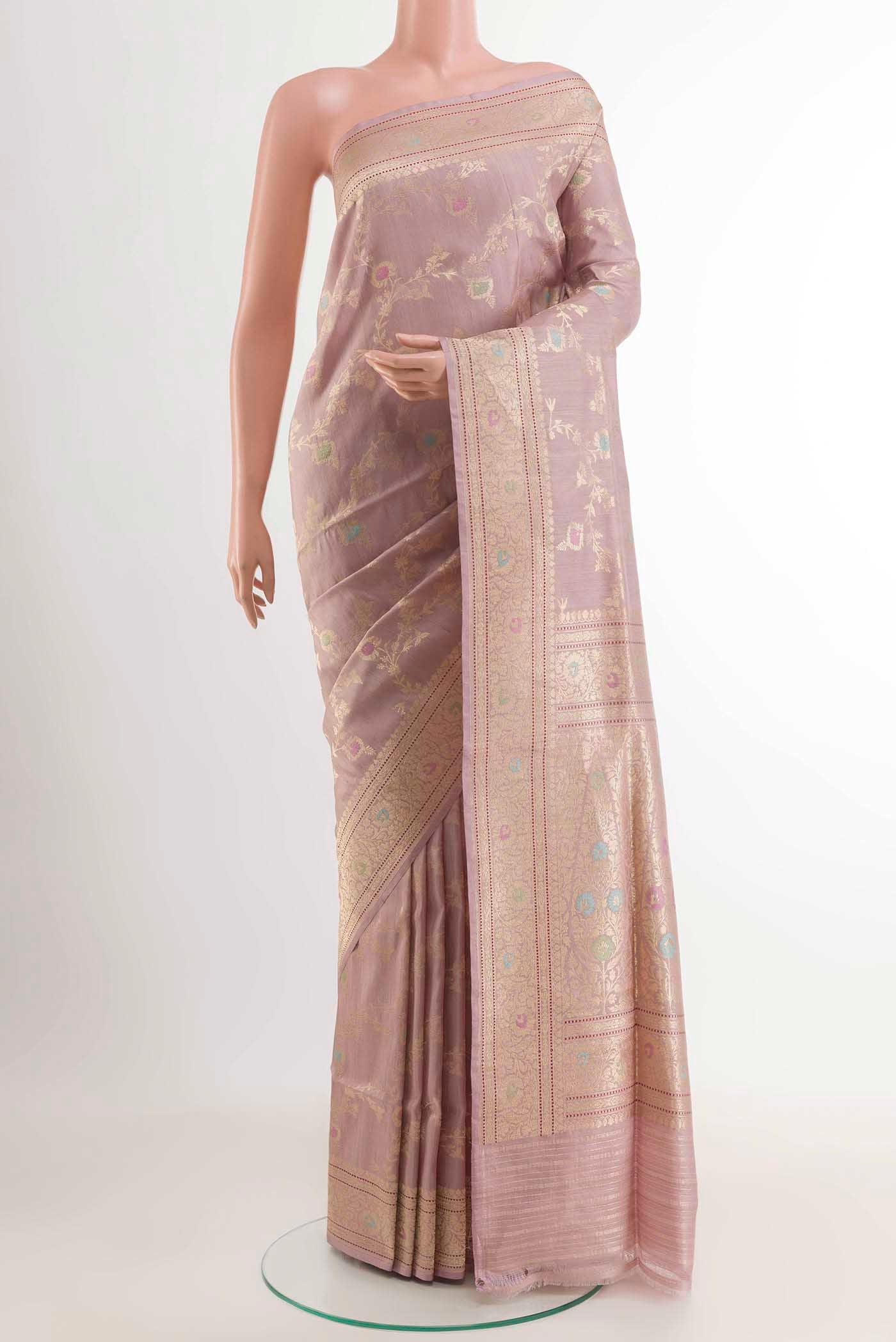 Lavender Banarasi Silk Saree with Zari Brocade on the body and Zari Border displayed on a mannequin