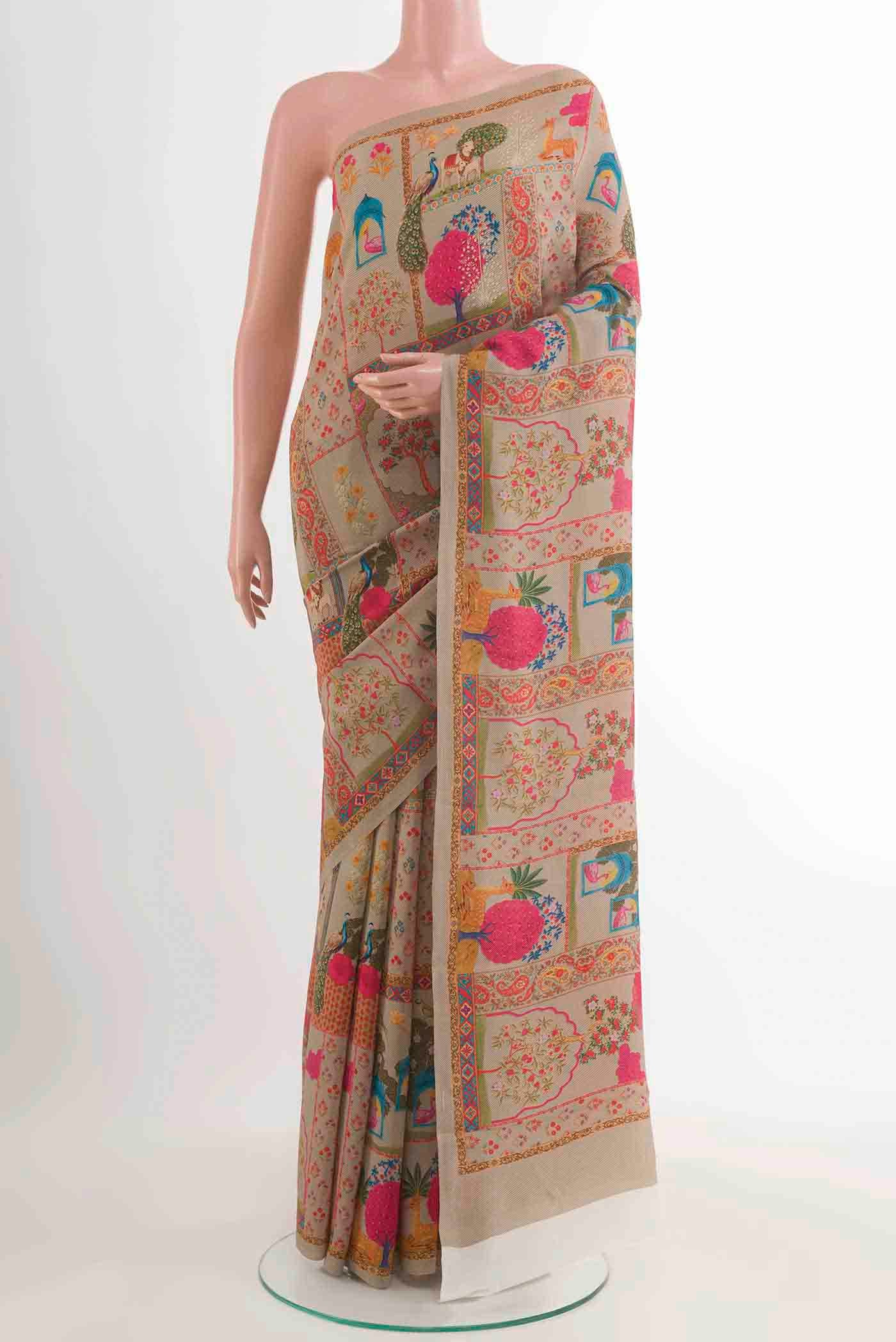 Beige Crepe Saree with Printed design on the body and Plain Border displayed on a mannequin