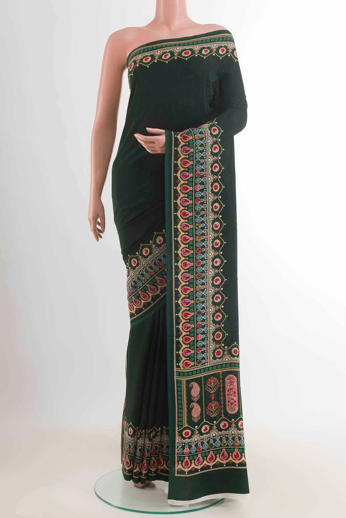 Bottle Green Mysore Crepe Saree with Printed design on the body and Printed Border displayed on a mannequin