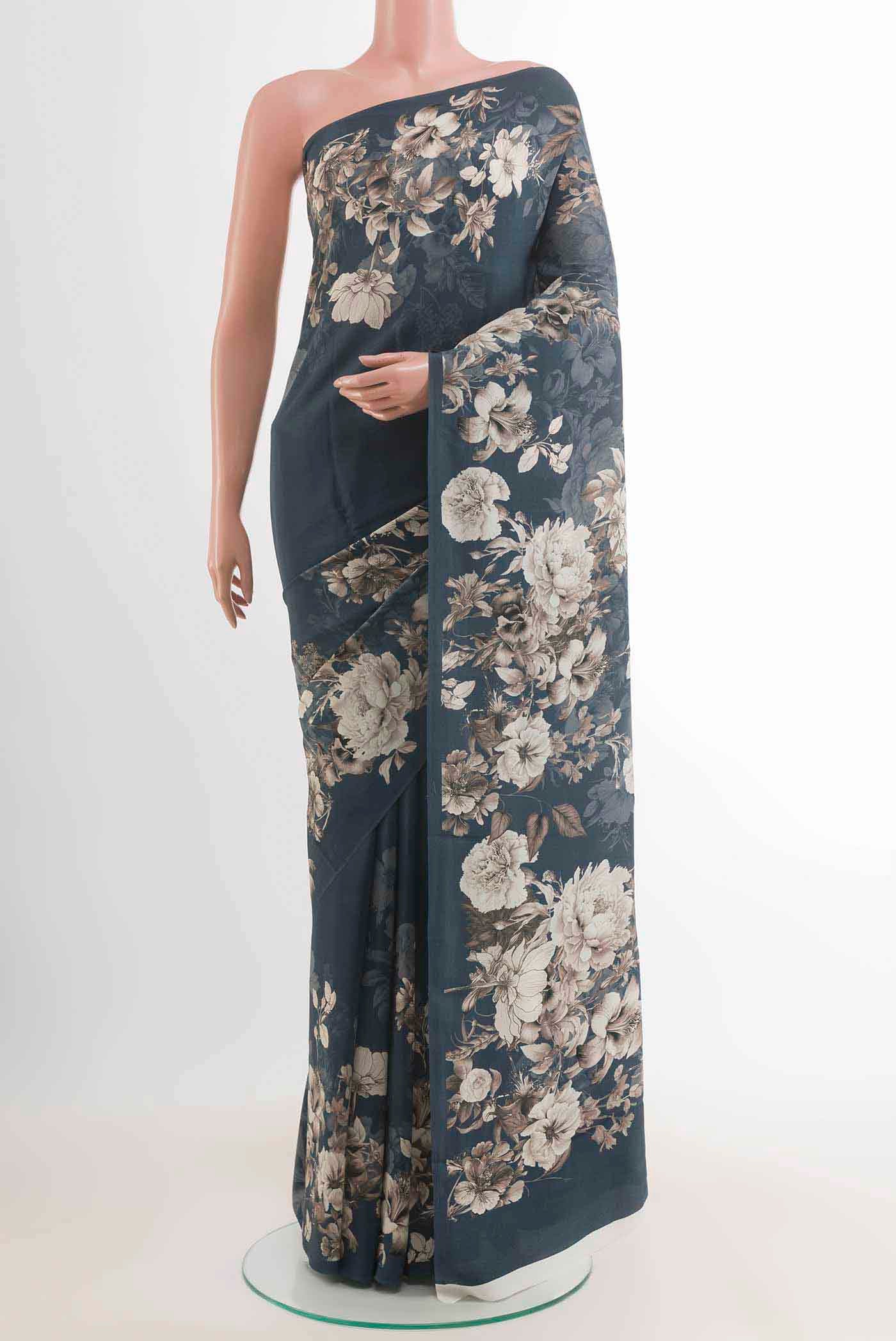 Blue Mysore Crepe Saree with Floral Print on the body and Without Border displayed on a mannequin