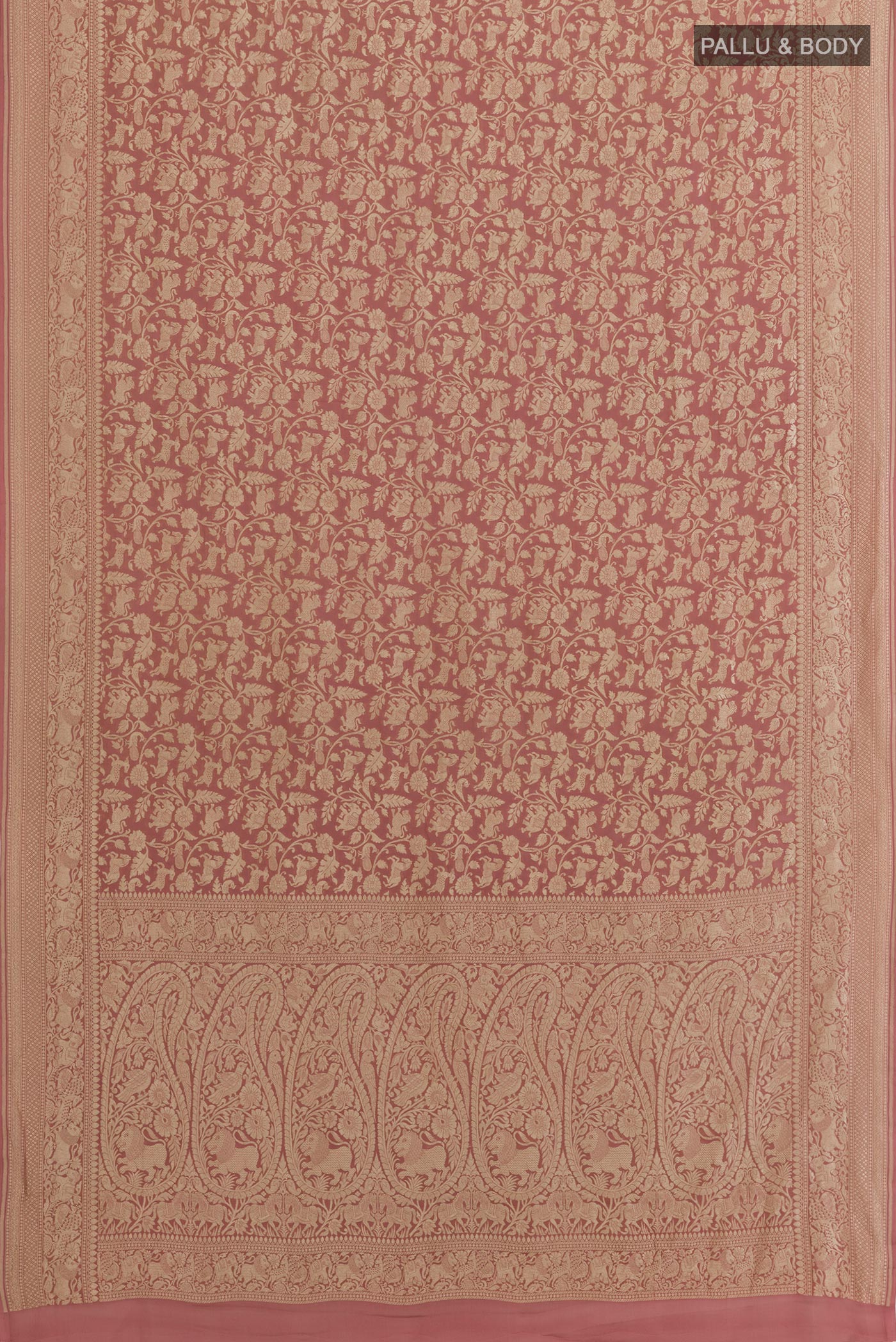 Flat view of Rose Gold Banarasi Georgette Saree with Zari Brocade on the body and Zari Border. 