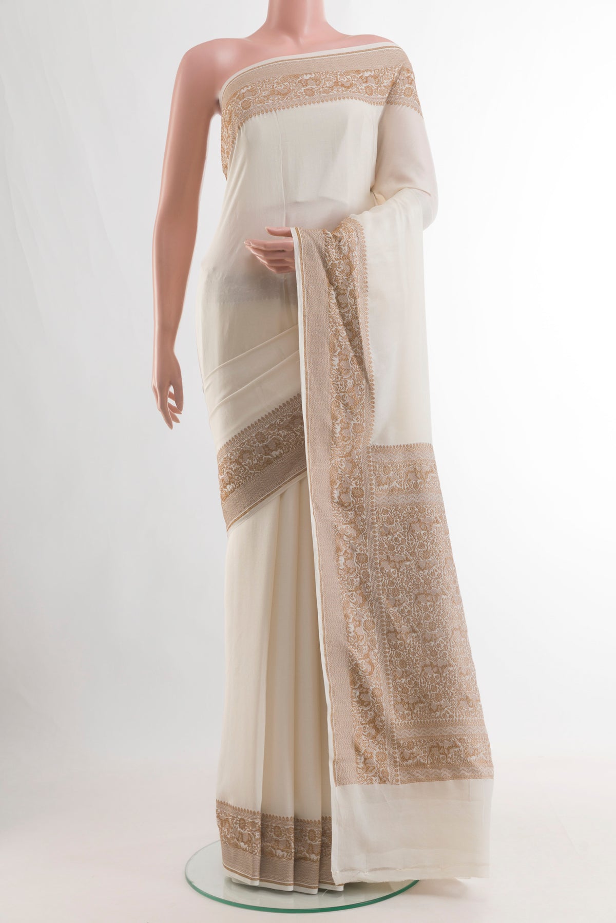 Pure Silk Off White Mysore Crepe Saree with Plain Body and Zari Border.  displayed on a mannequin